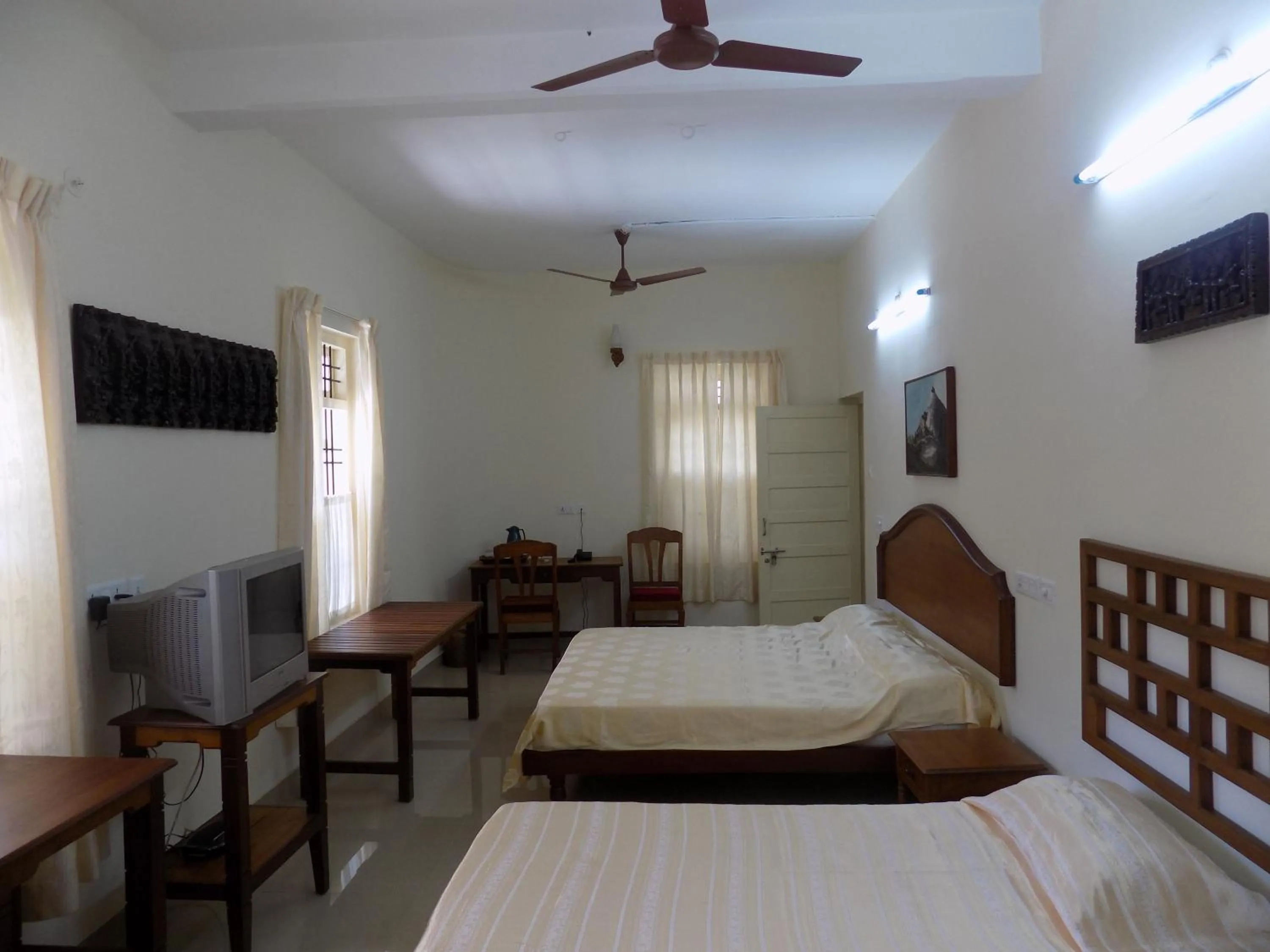 Photo of the whole room, Bed in Safire Residency