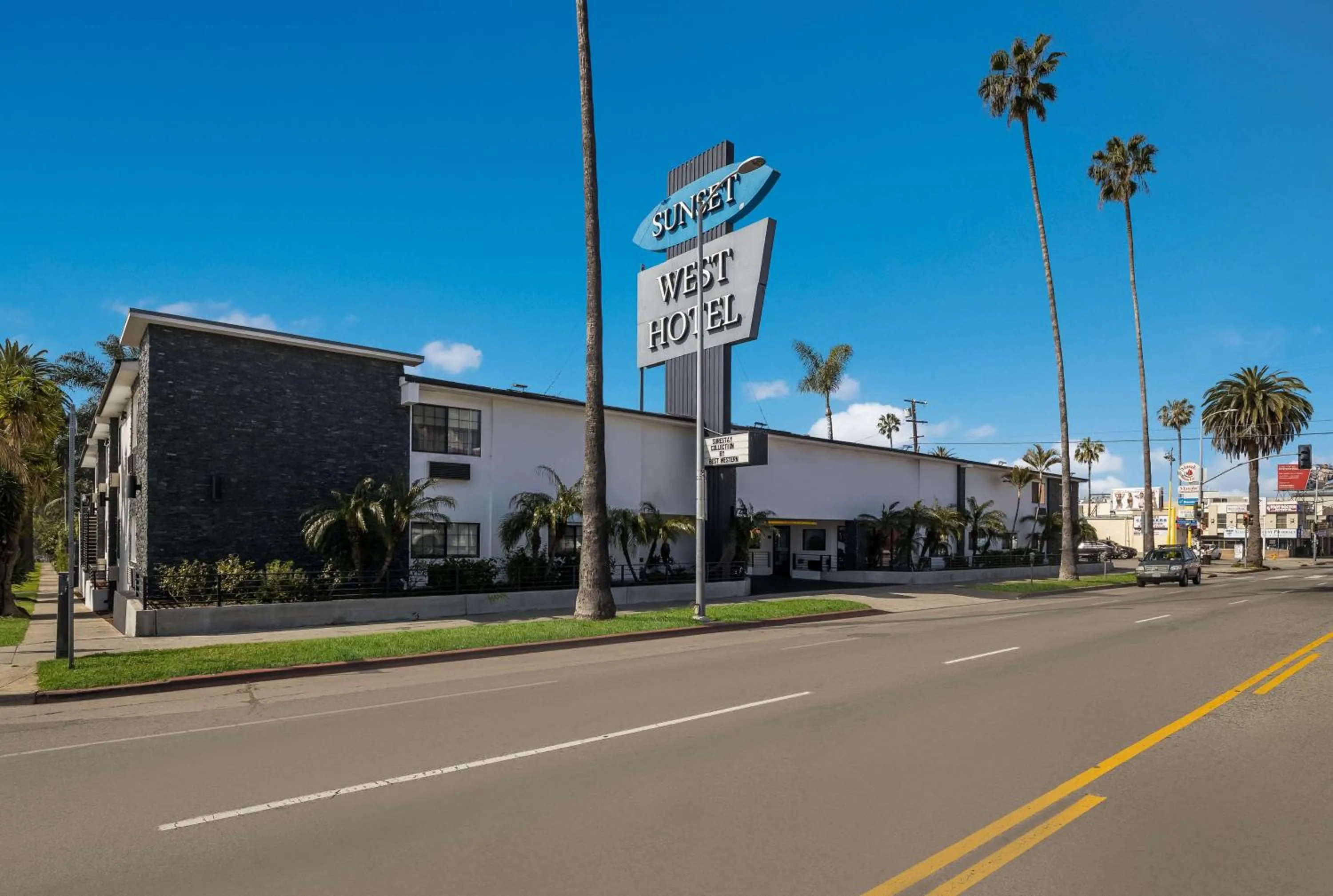 Property building in Sunset West Hotel, SureStay Collection By Best Western