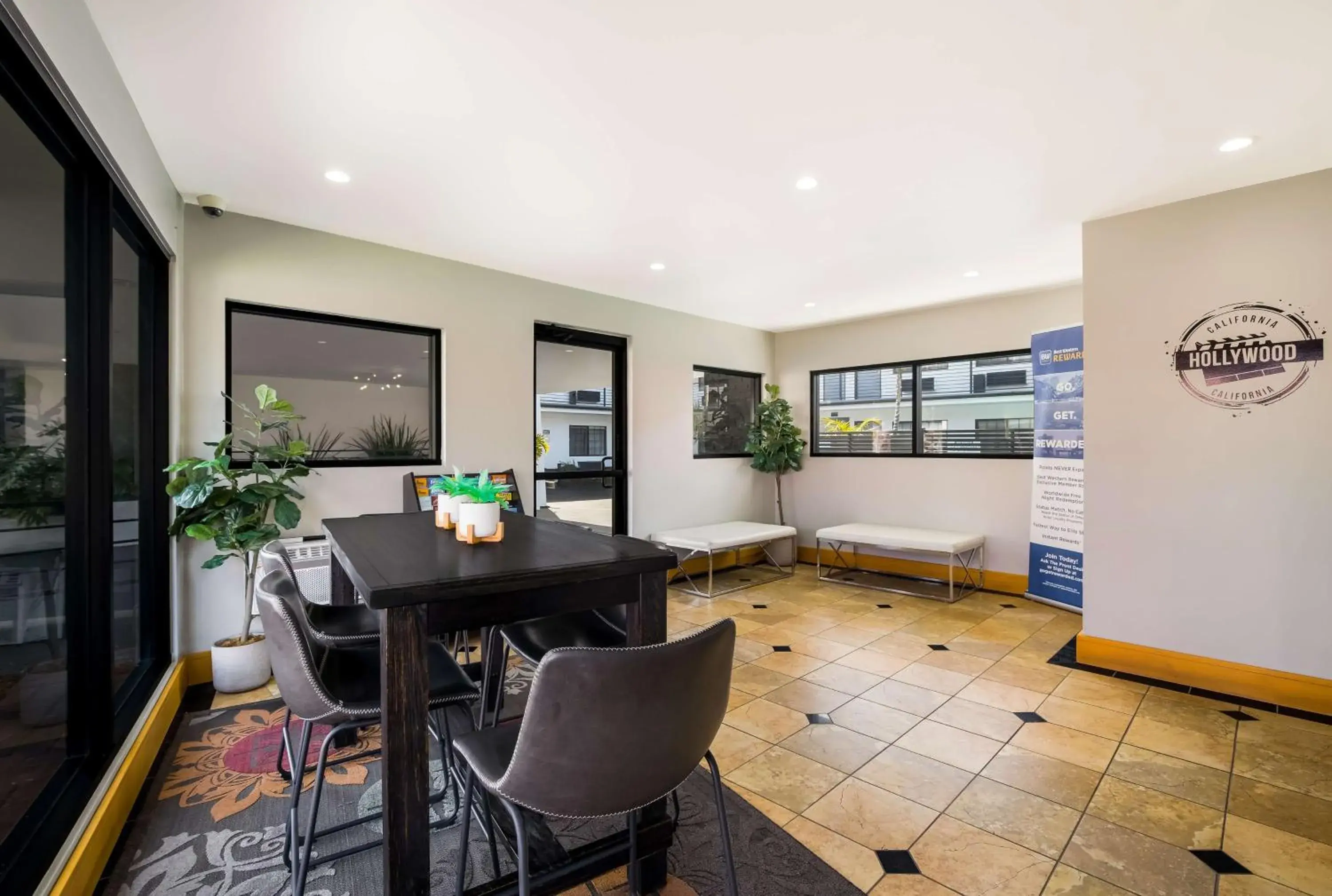 Lobby or reception in Sunset West Hotel, SureStay Collection By Best Western Lobby or reception in Sunset West Hotel, SureStay Collection By Best Western