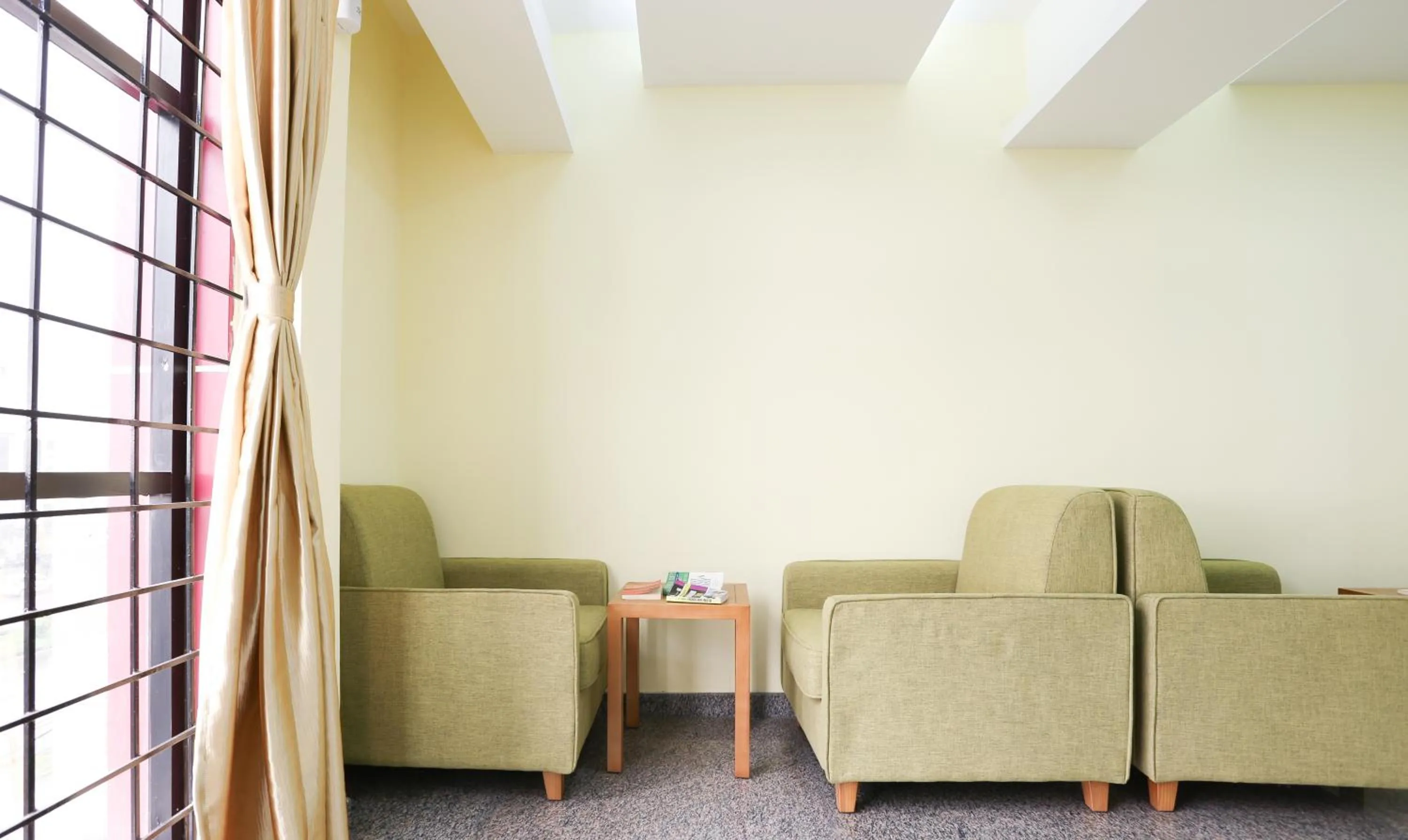 Seating area in Treebo The Galaxy Bommasandra