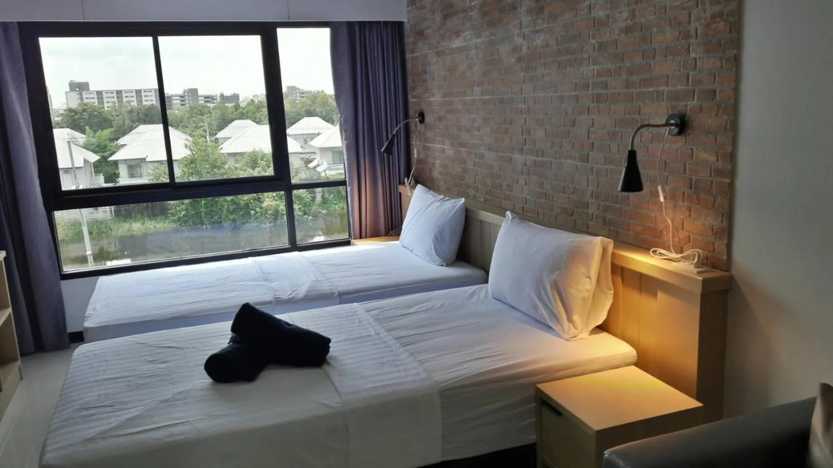 Photo of the whole room, Bed in Bangkok Boutique Resort Rangsit