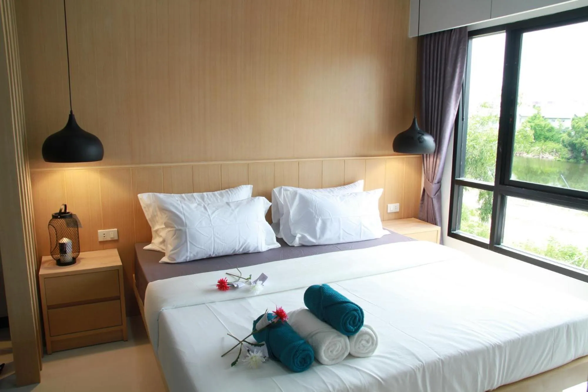 Photo of the whole room, Bed in Bangkok Boutique Resort Rangsit