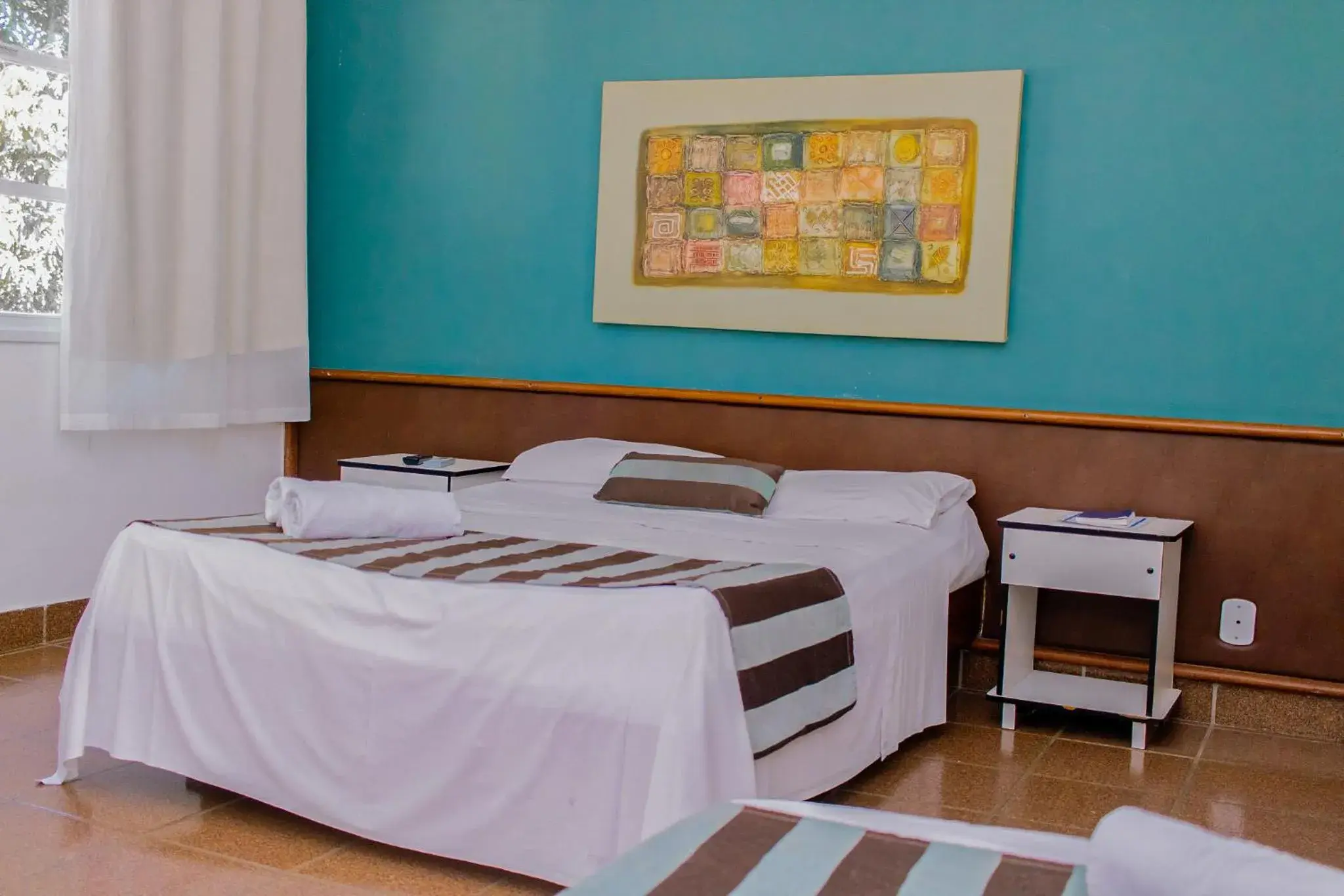 Bed in Guarapousada Bed in Guarapousada