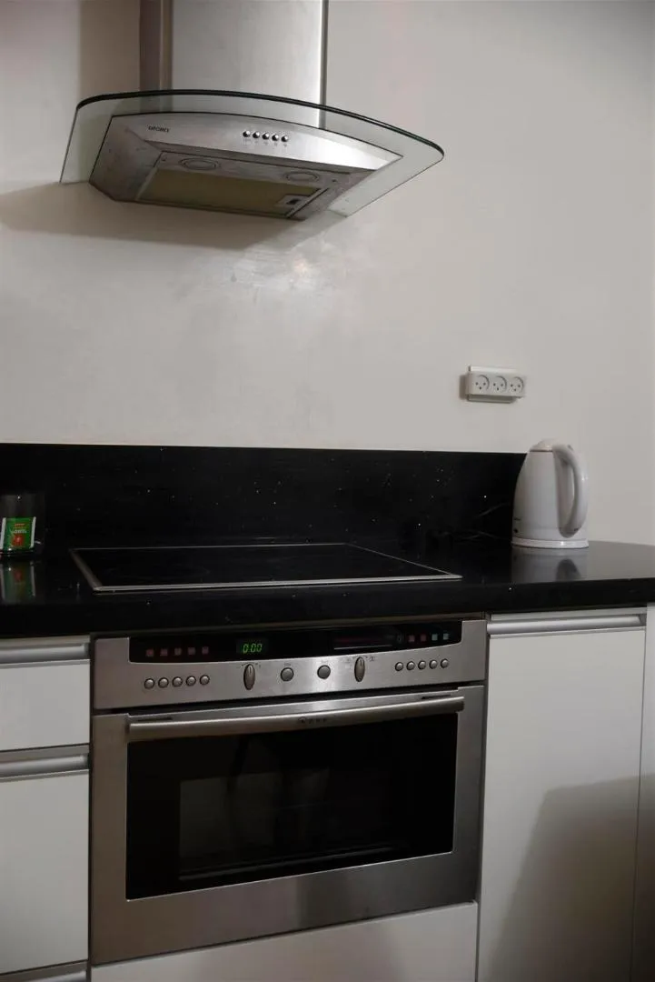 Kitchen or kitchenette in City Resort Palmore