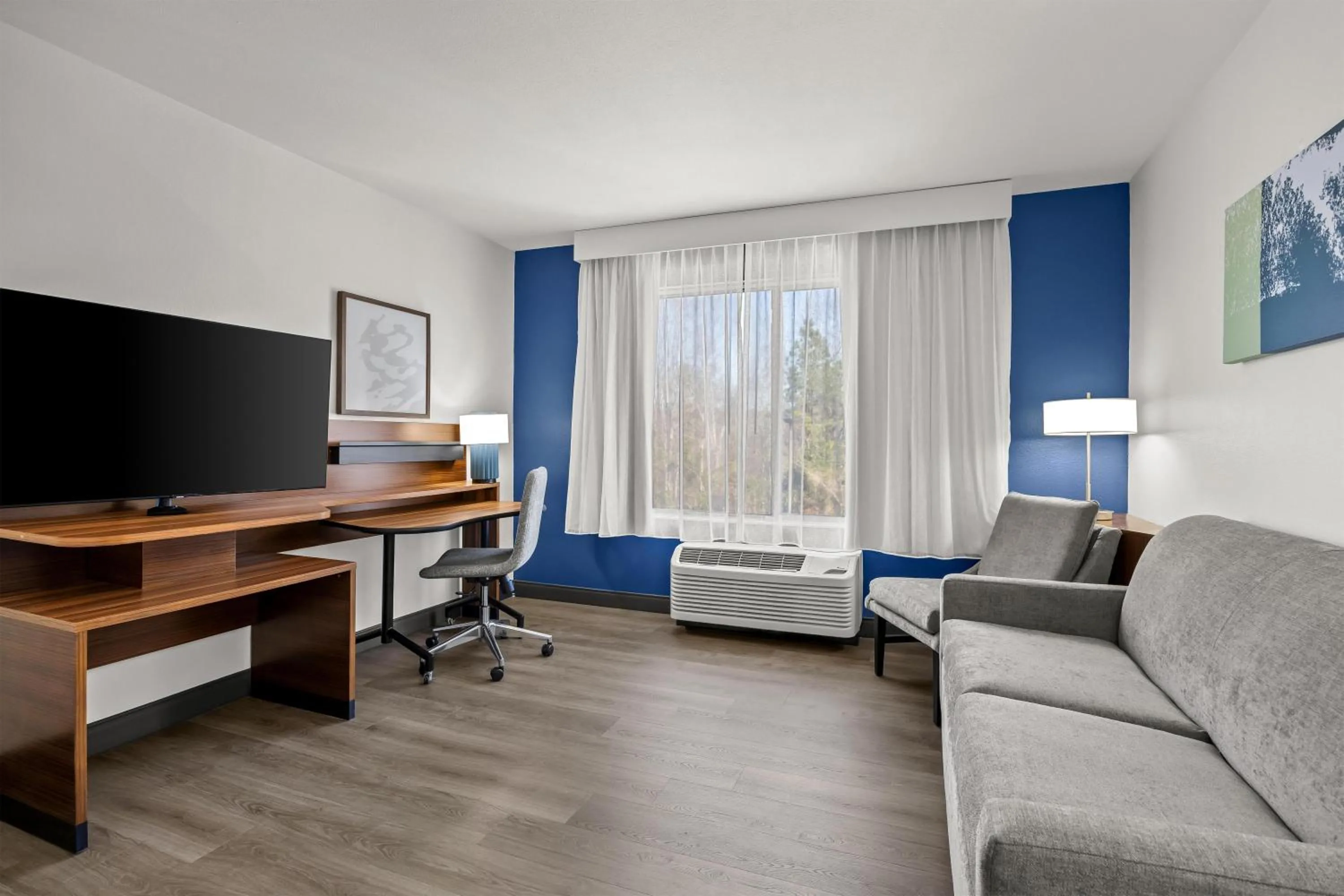 Living room in Spark by Hilton Macon North