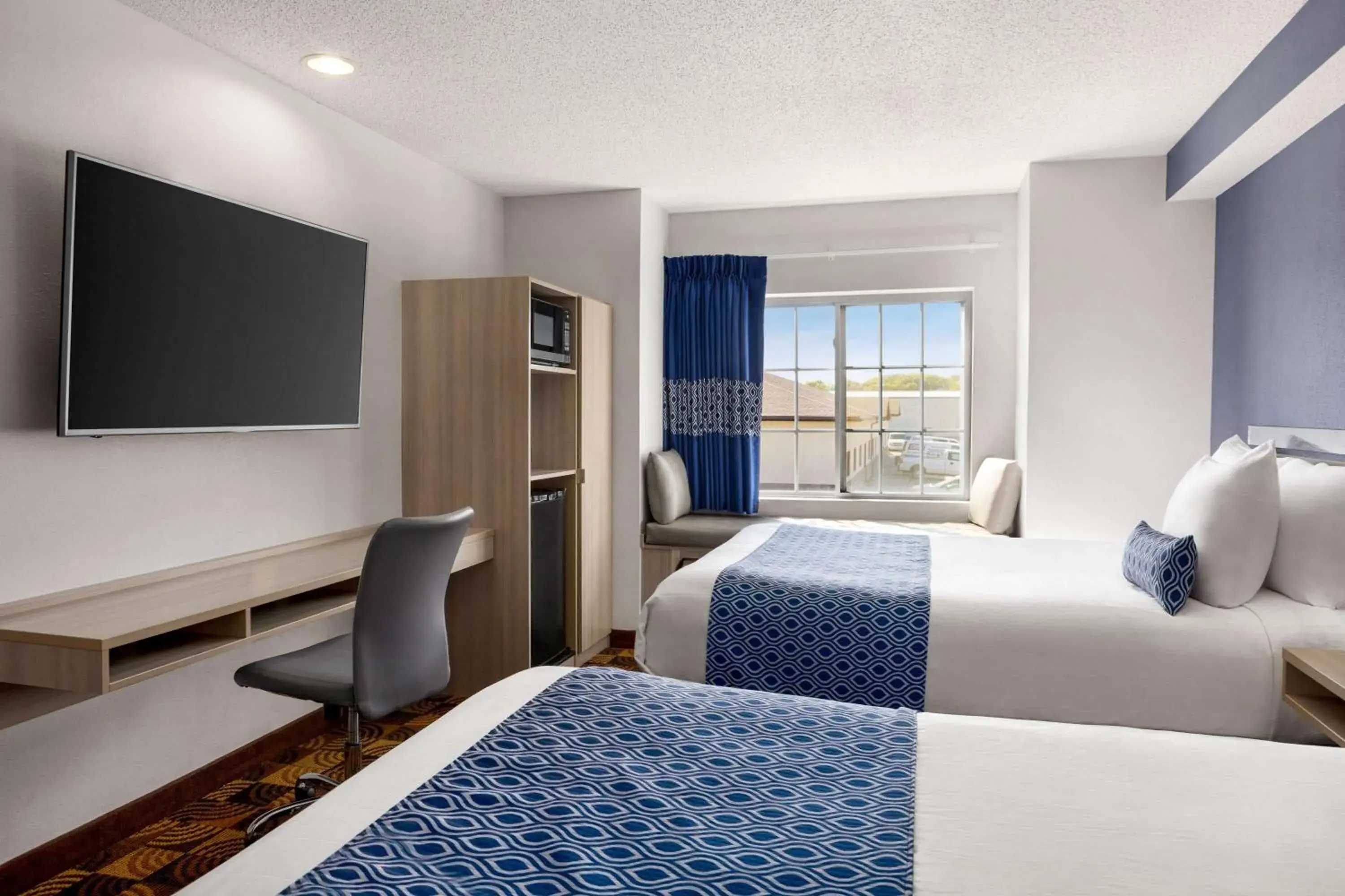 Photo of the whole room, Bed in Microtel Inn & Suites Lincoln Photo of the whole room, Bed in Microtel Inn & Suites Lincoln