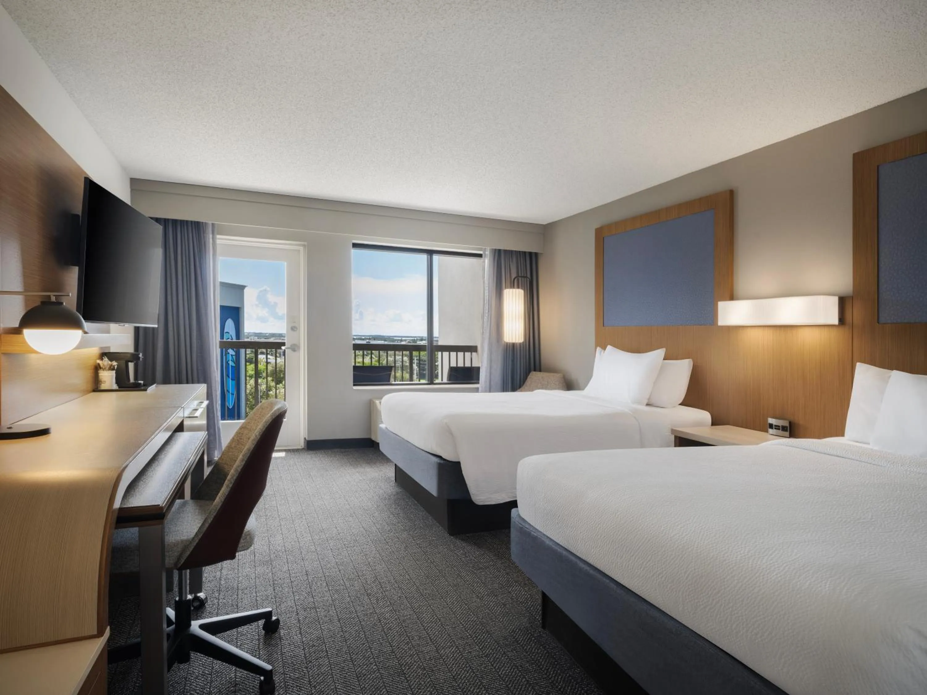 Bed in Courtyard by Marriott Cocoa Beach Cape Canaveral