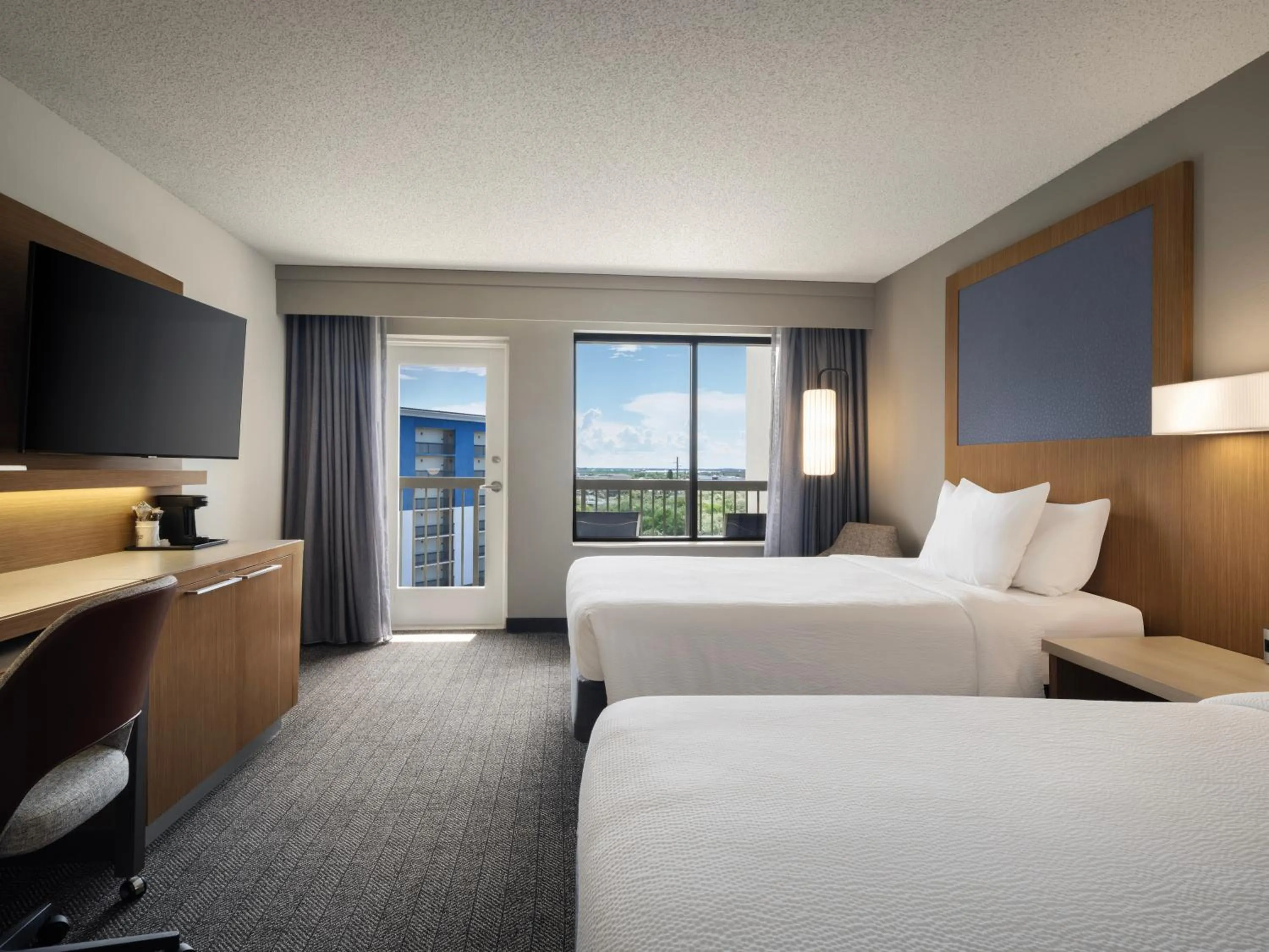 Photo of the whole room, Bed in Courtyard by Marriott Cocoa Beach Cape Canaveral