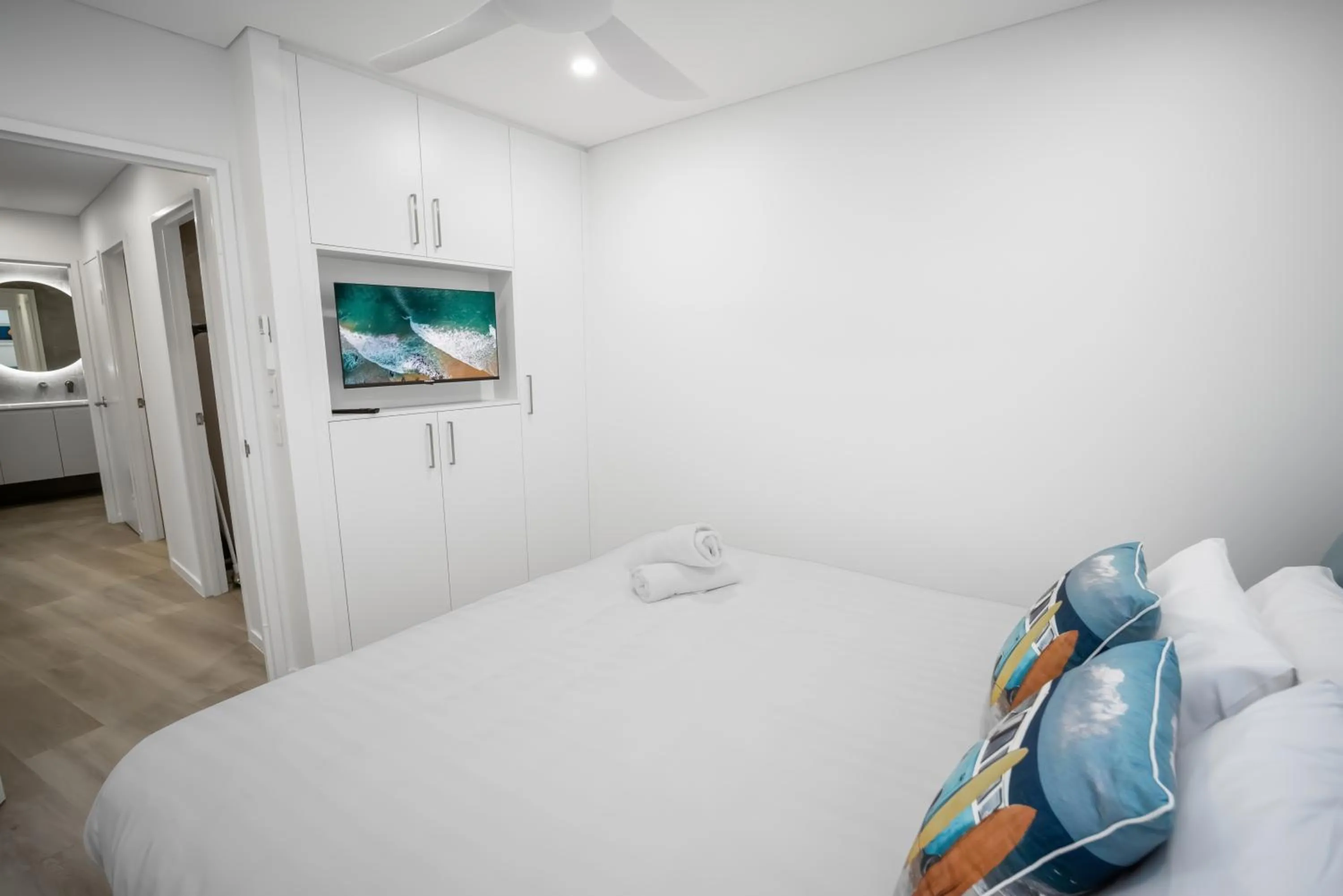 Bed in Bay Royal Apartments