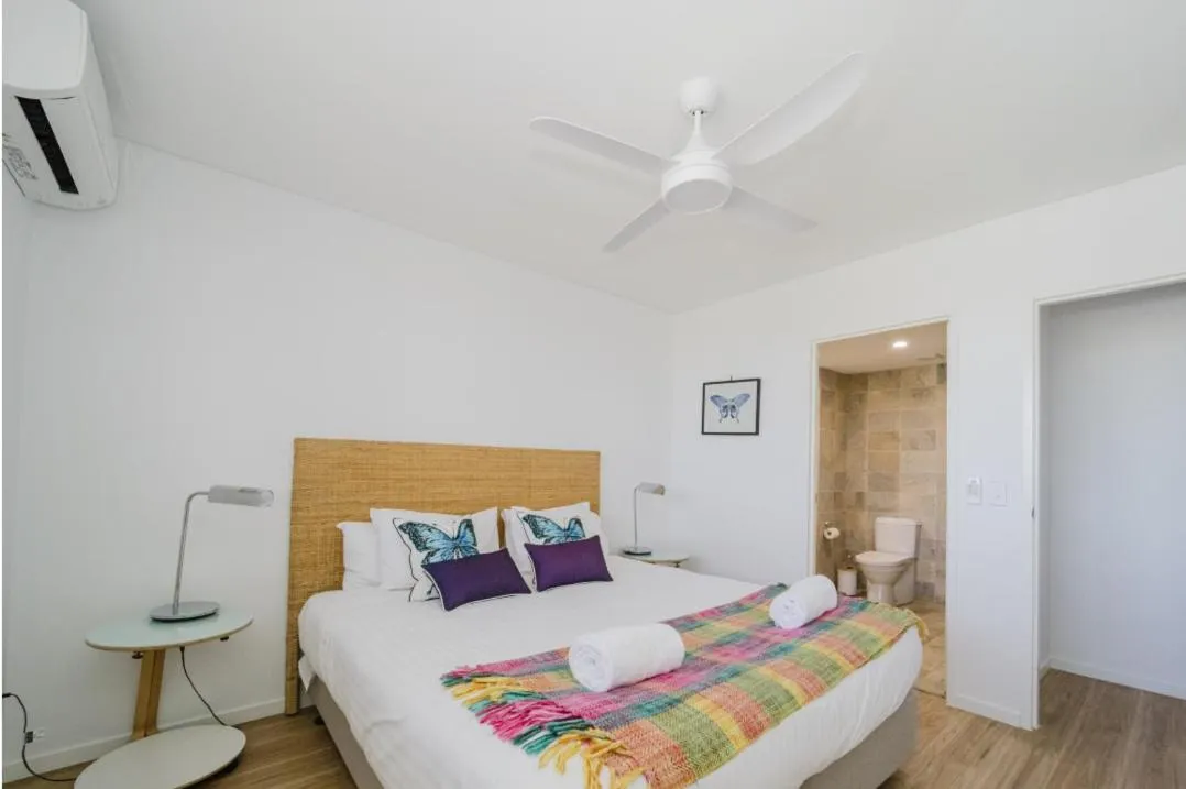 Bed in Bay Royal Apartments