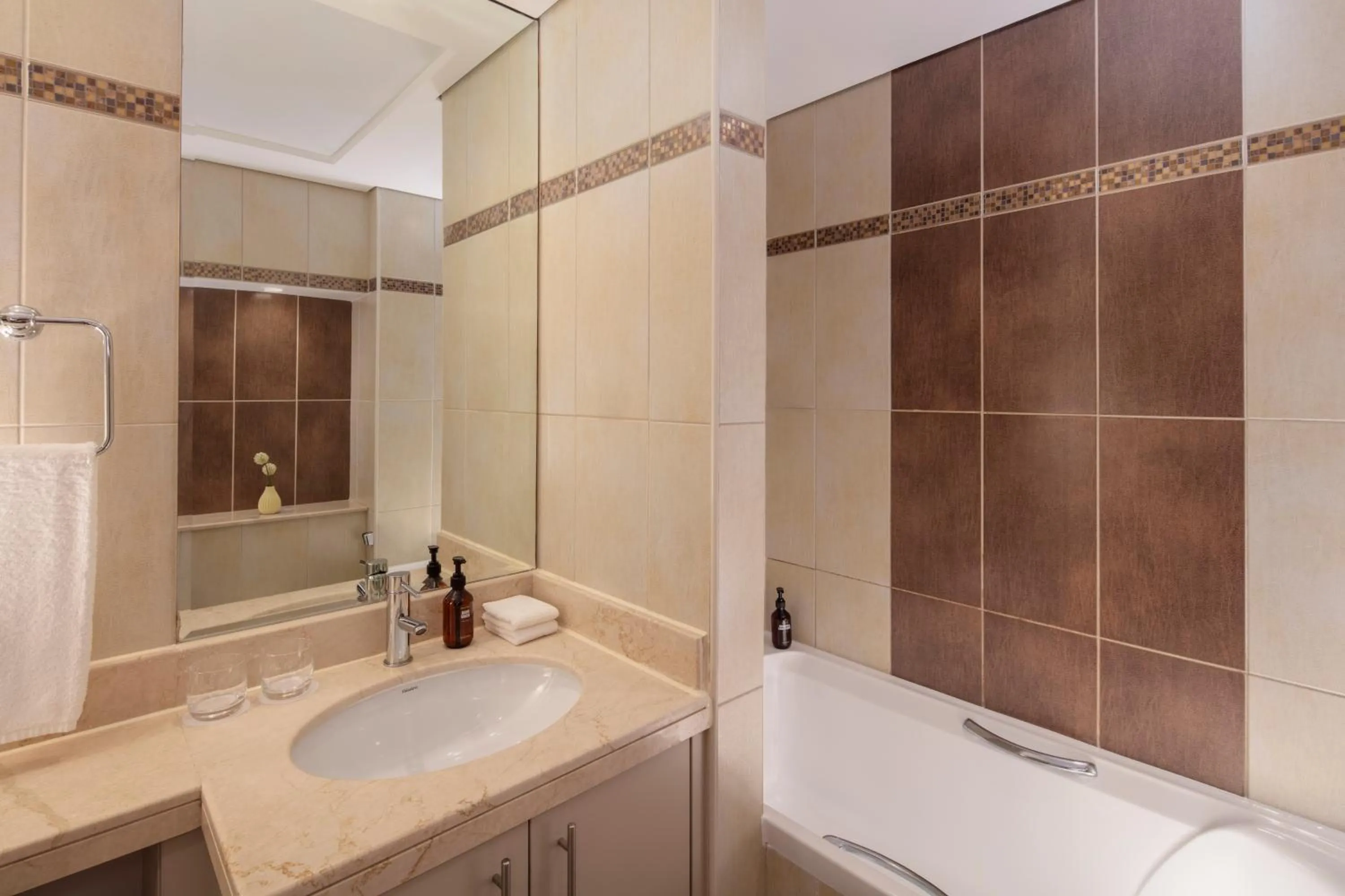 Bathroom in Staybridge Suites Dubai Internet City by IHG