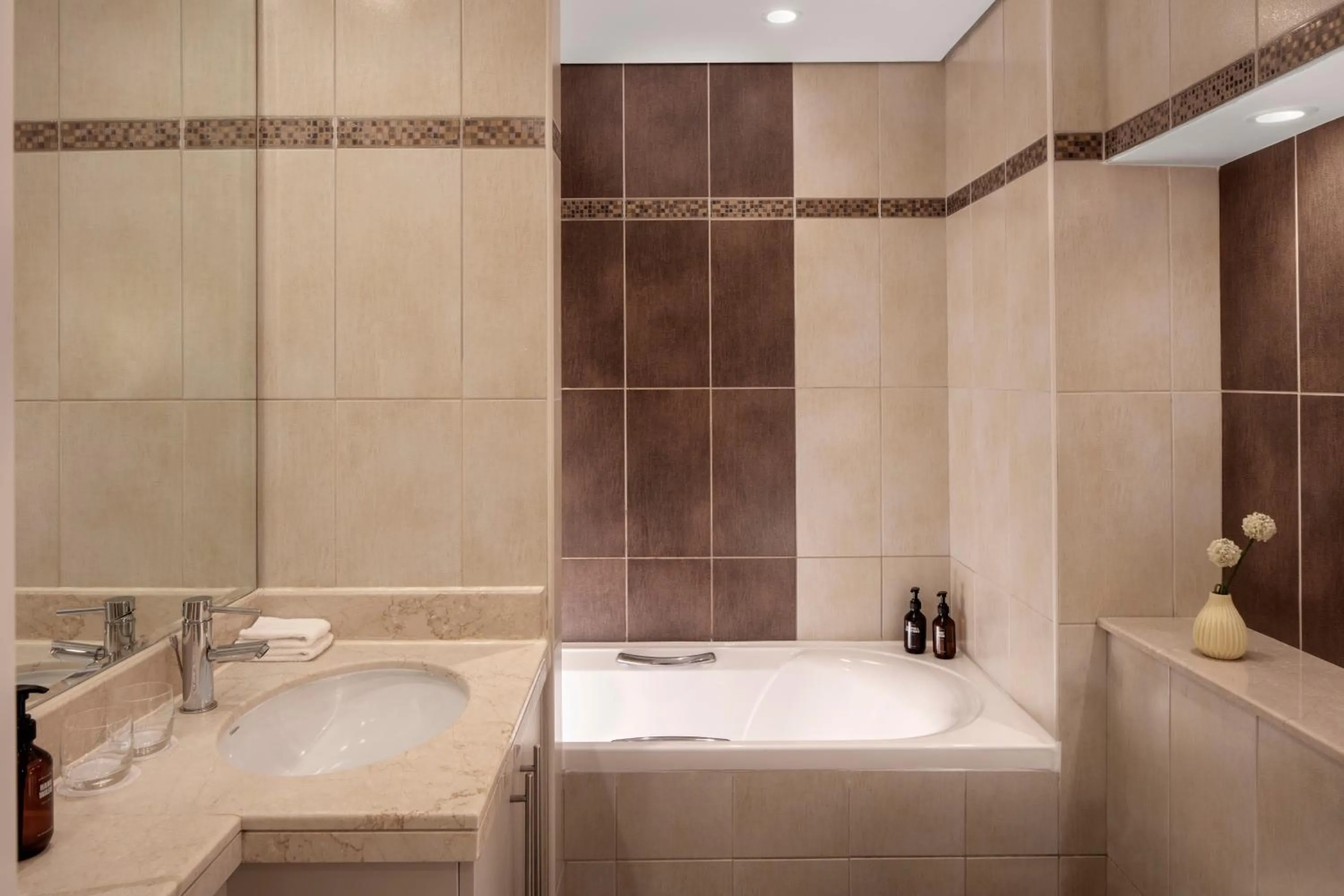Bathroom in Staybridge Suites Dubai Internet City by IHG