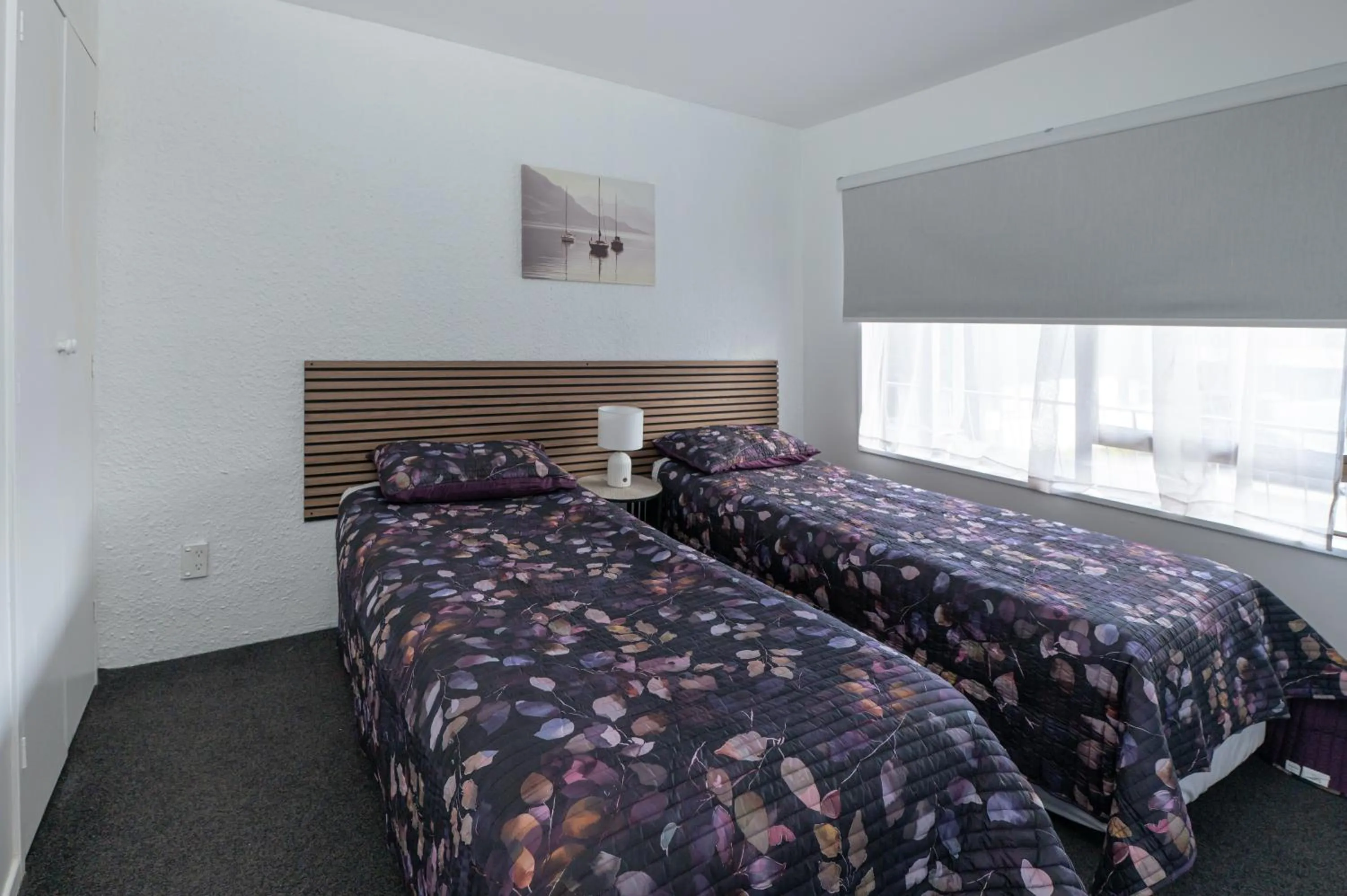 Bed in Aotea Motel