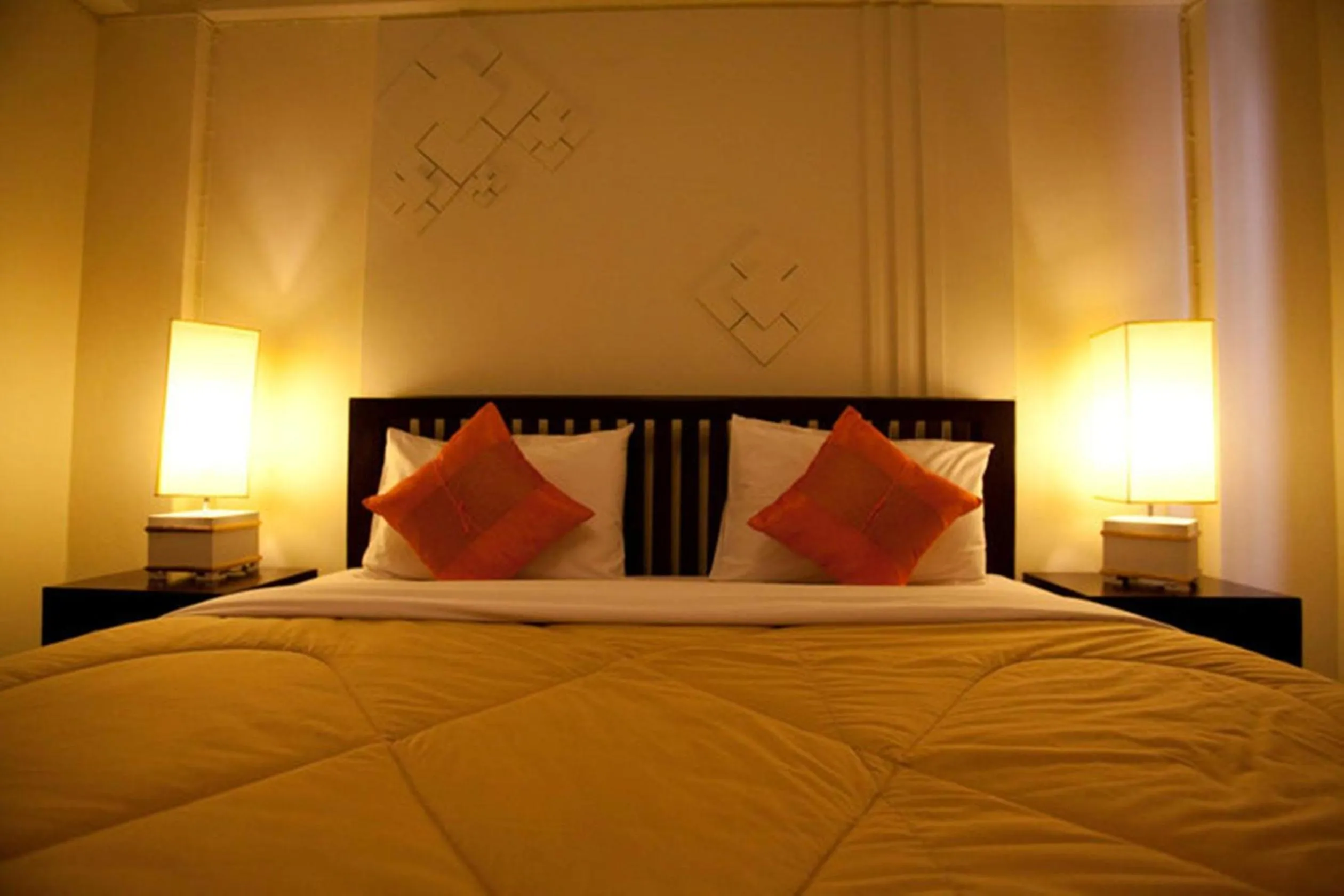 Bed in Yindee Stylish Guesthouse