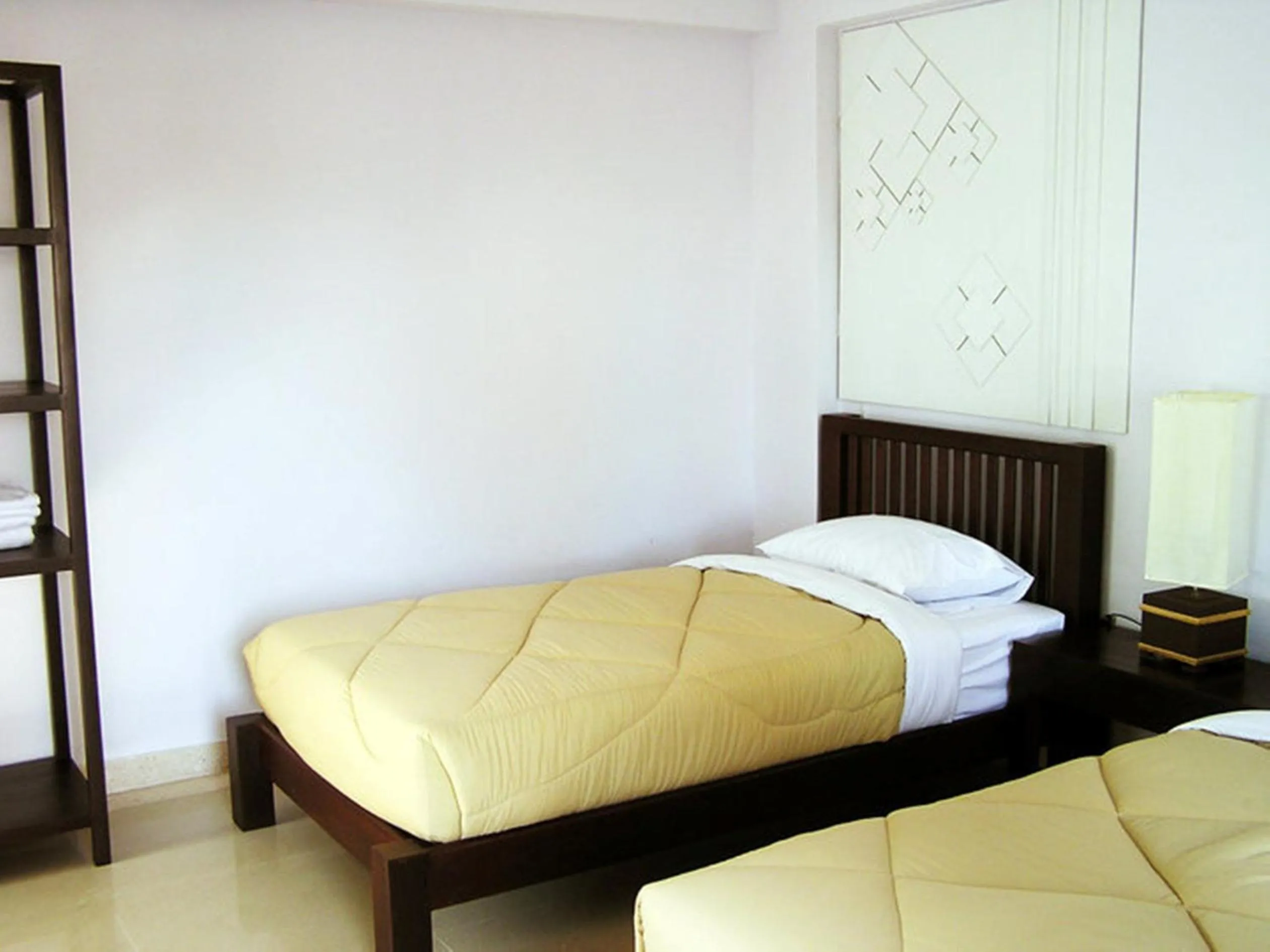Bed in Yindee Stylish Guesthouse