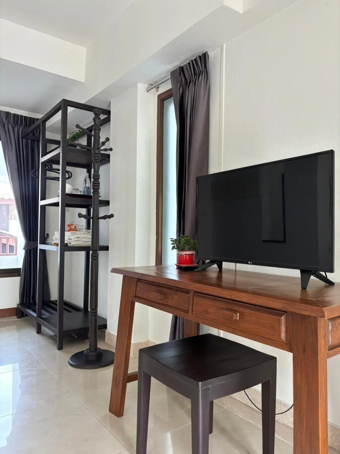 TV and multimedia in Yindee Stylish Guesthouse
