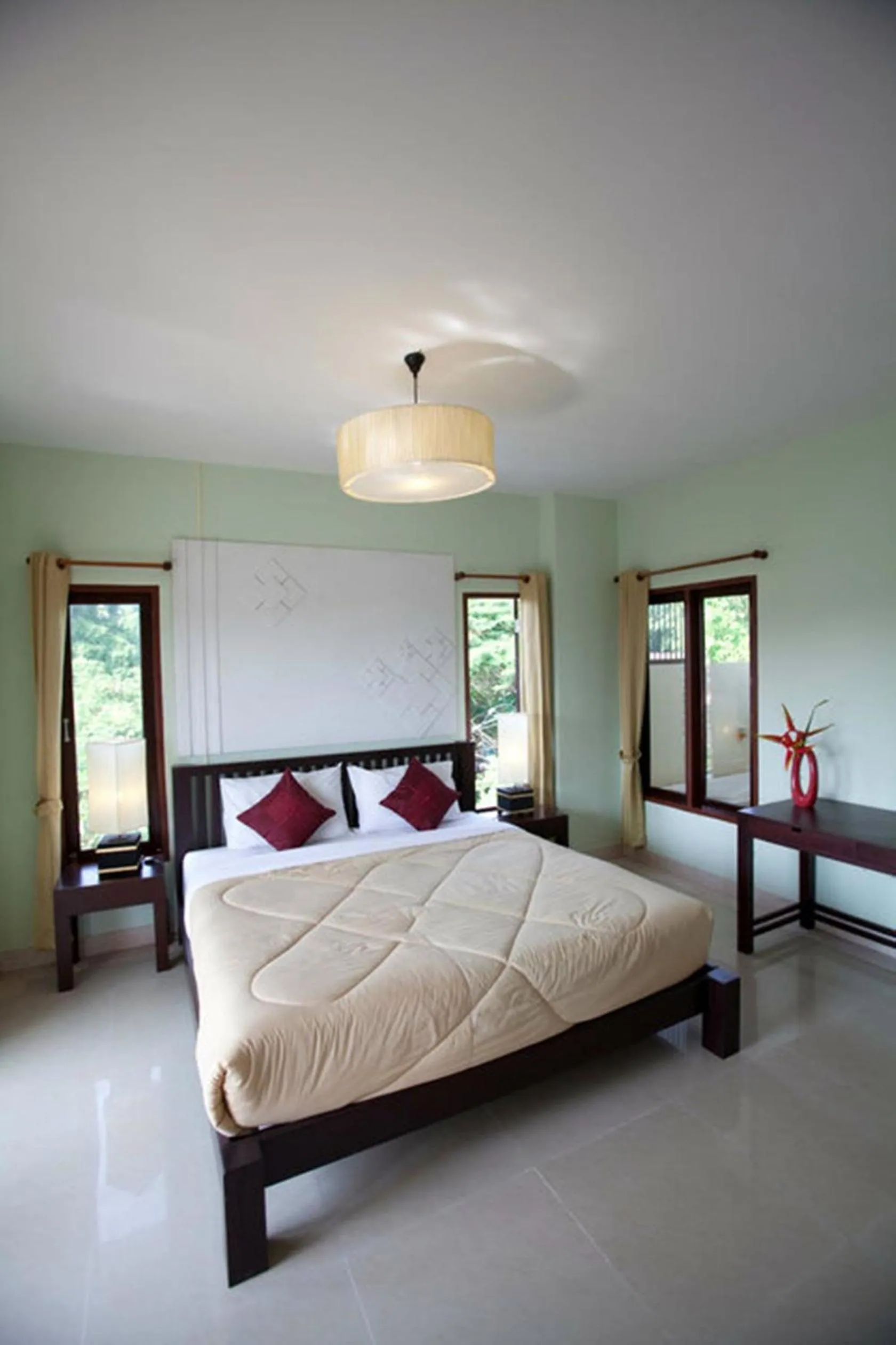Bed in Yindee Stylish Guesthouse