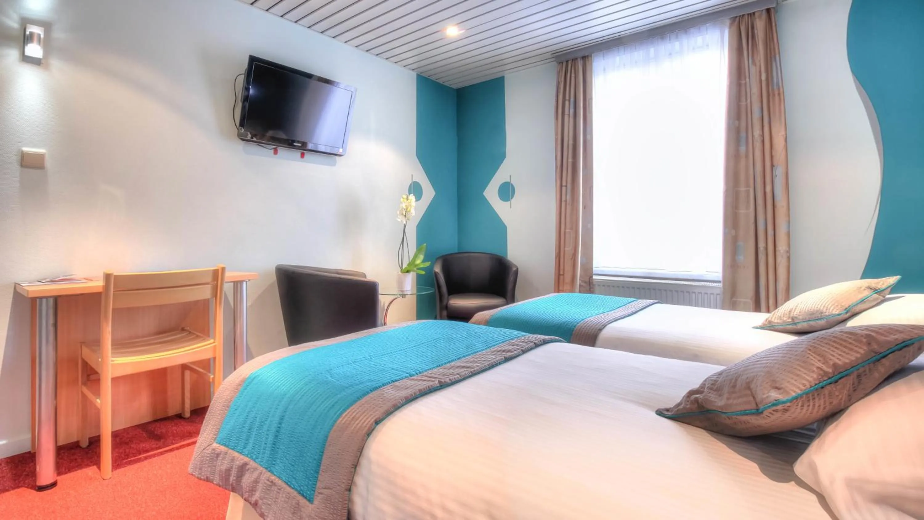 TV and multimedia, Bed in Hotel Le Terminus