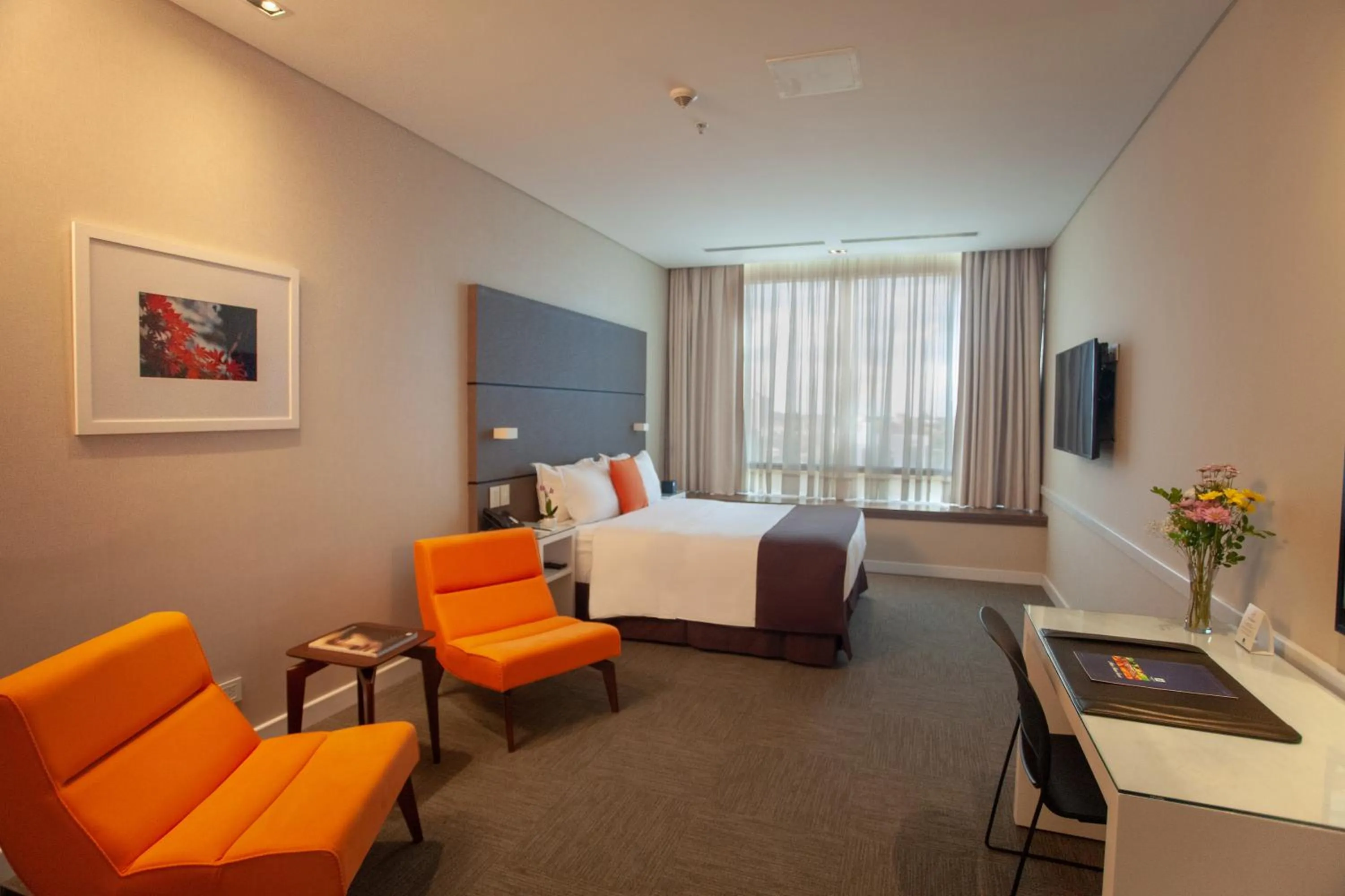 Bed in Paseo La Galería Hotel & Suites