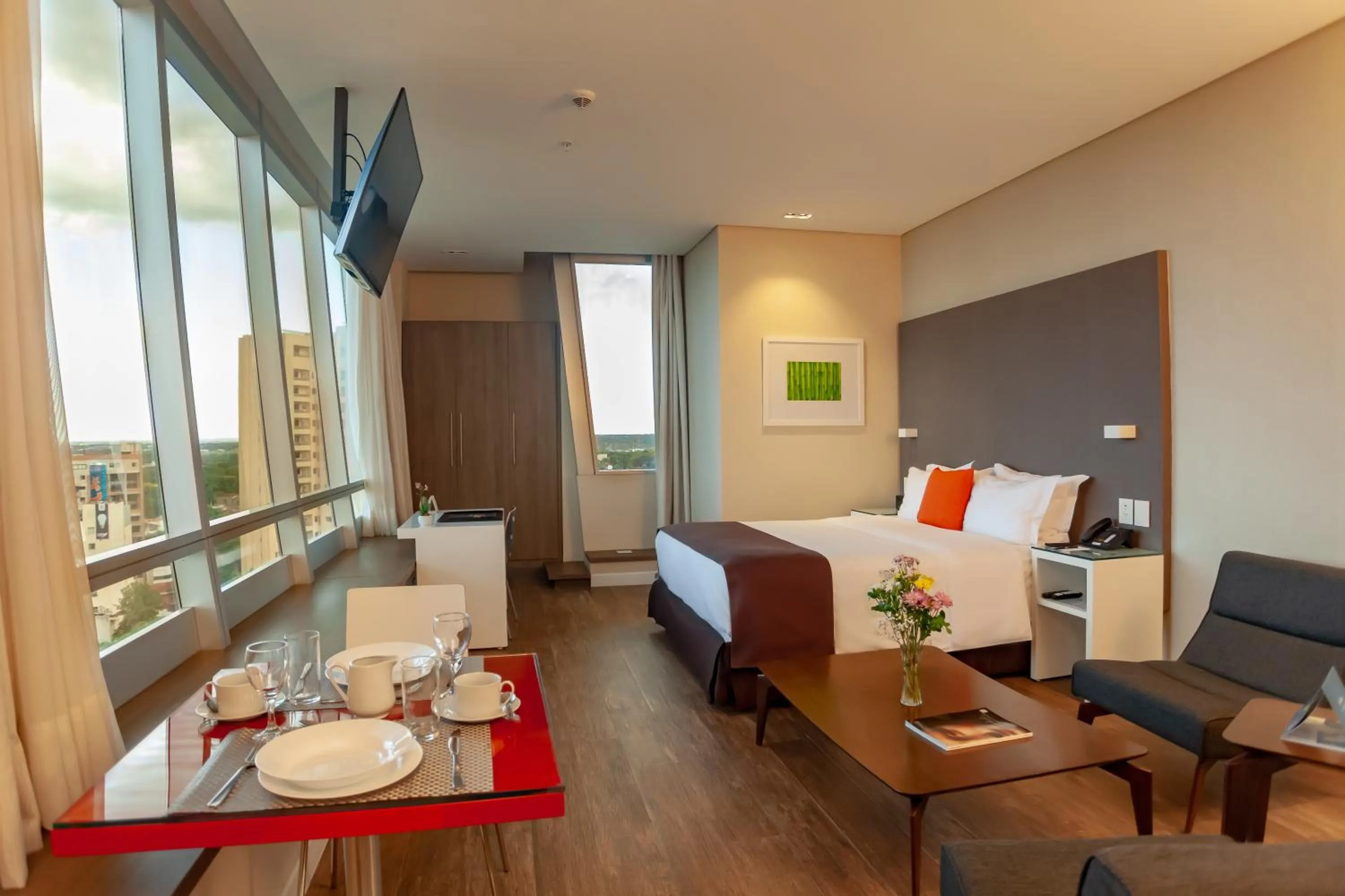 Bed in Paseo La Galería Hotel & Suites