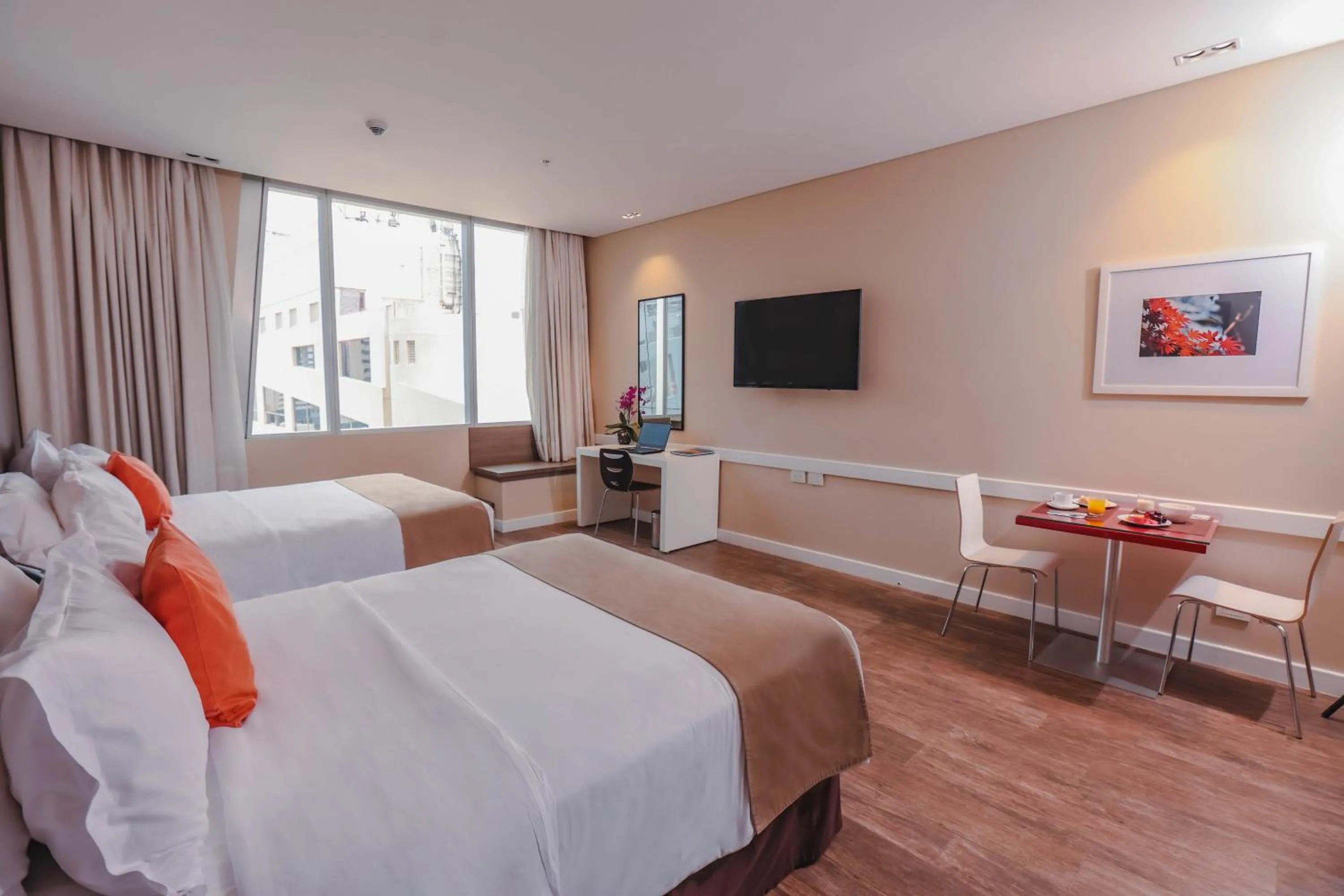 Bed in Paseo La Galería Hotel & Suites