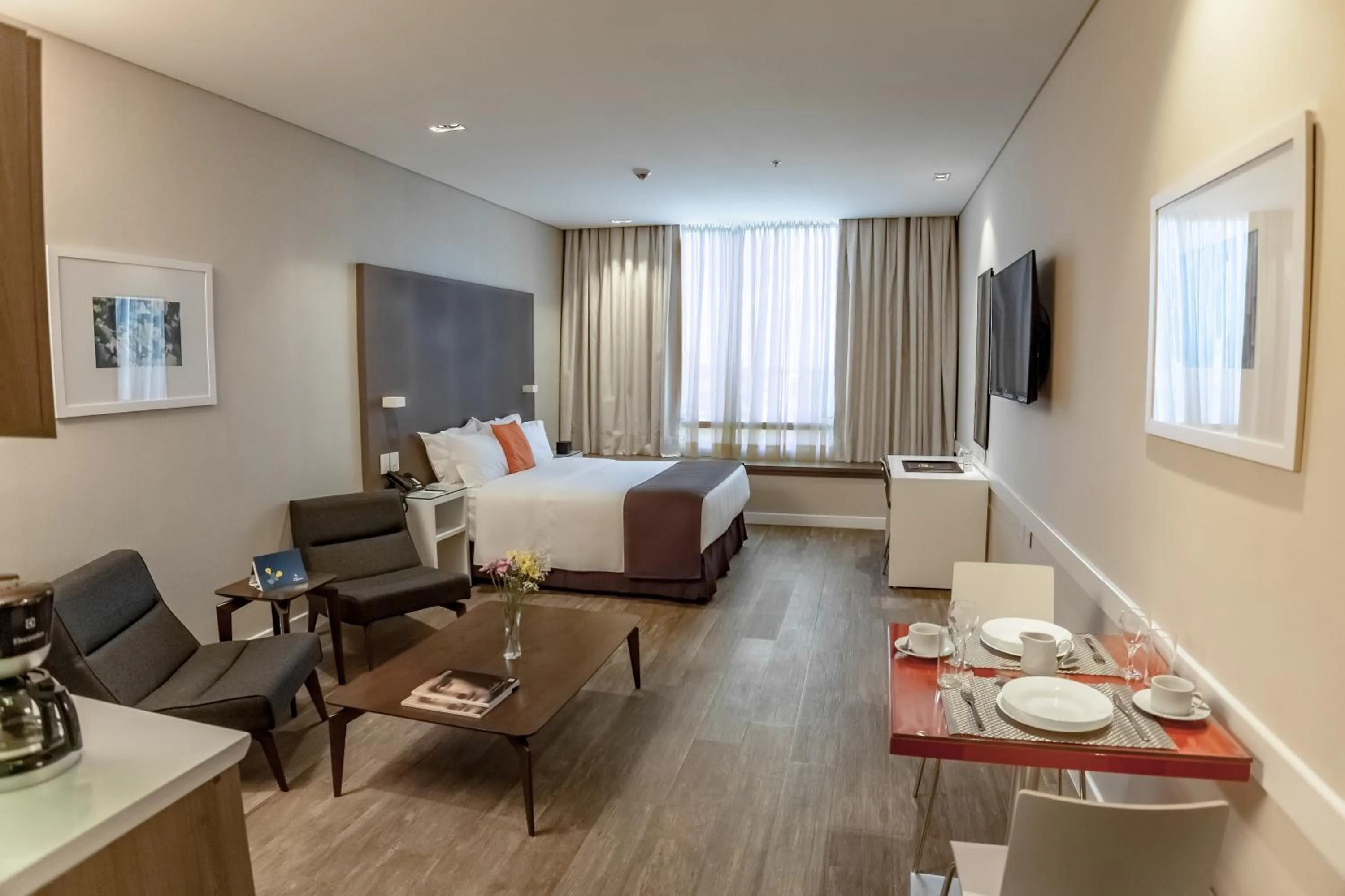 Bed in Paseo La Galería Hotel & Suites