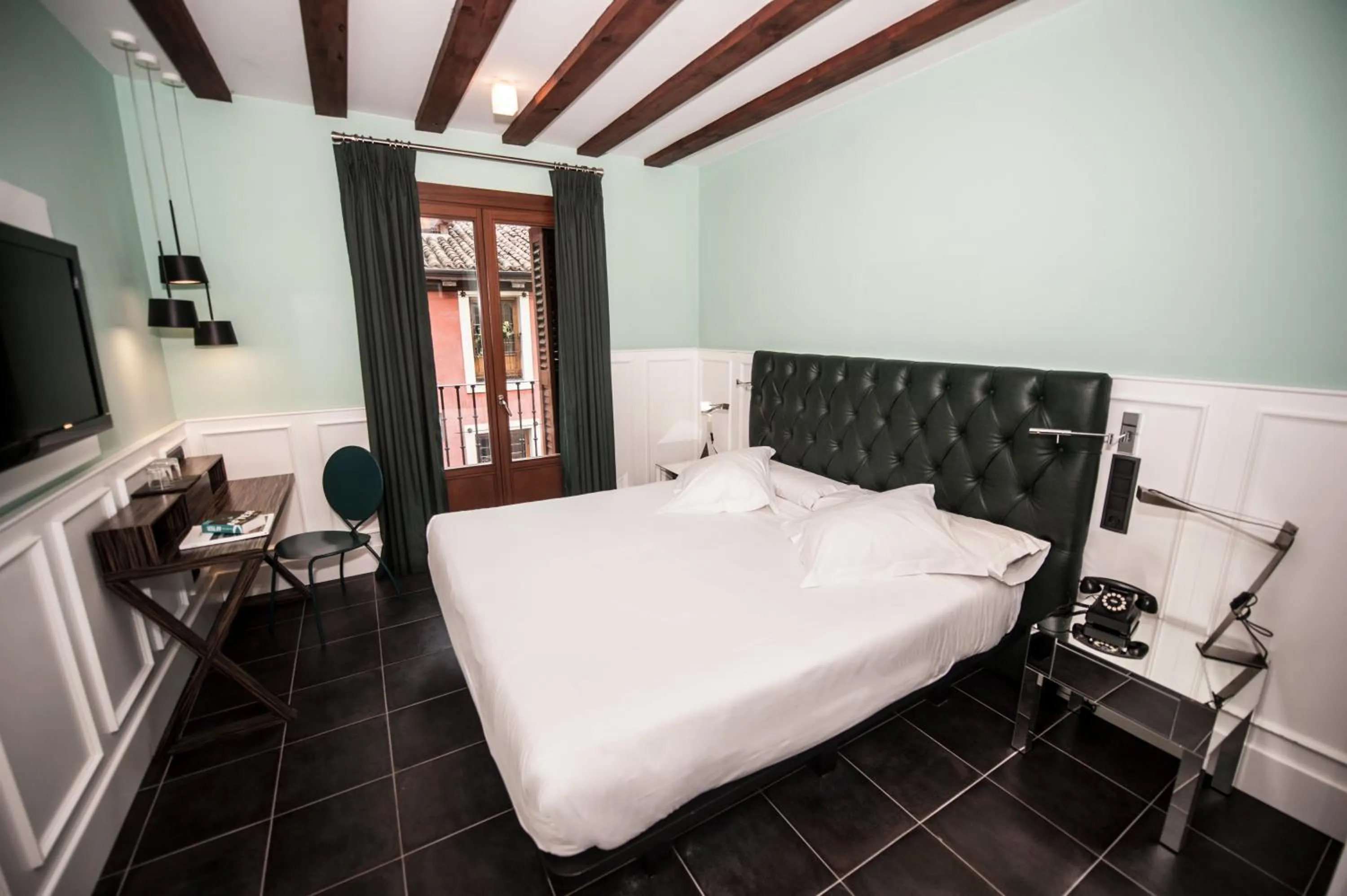 Bed in Posada del León de Oro Boutique Hotel