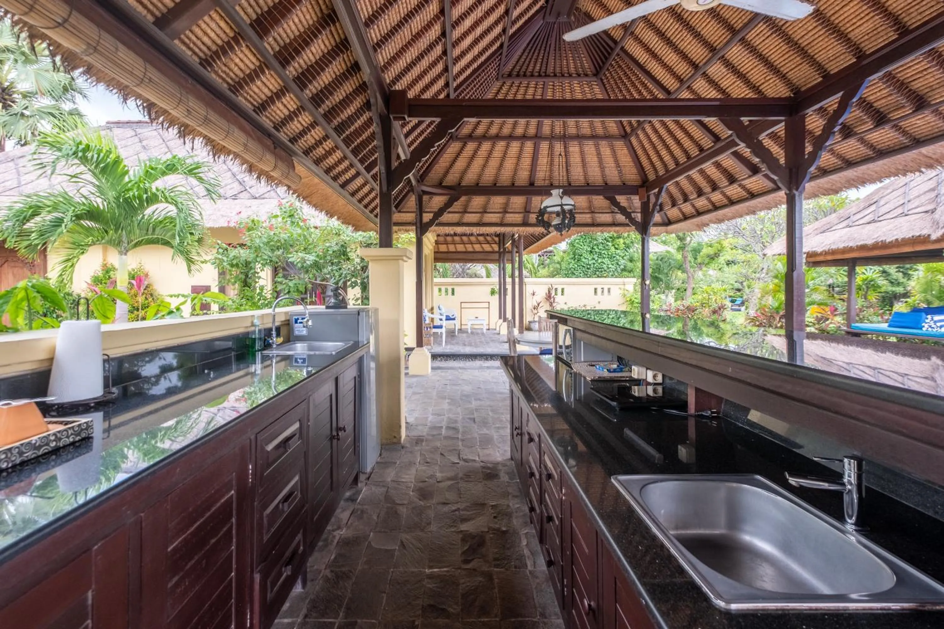 Kitchen or kitchenette in Amertha Bali Villas