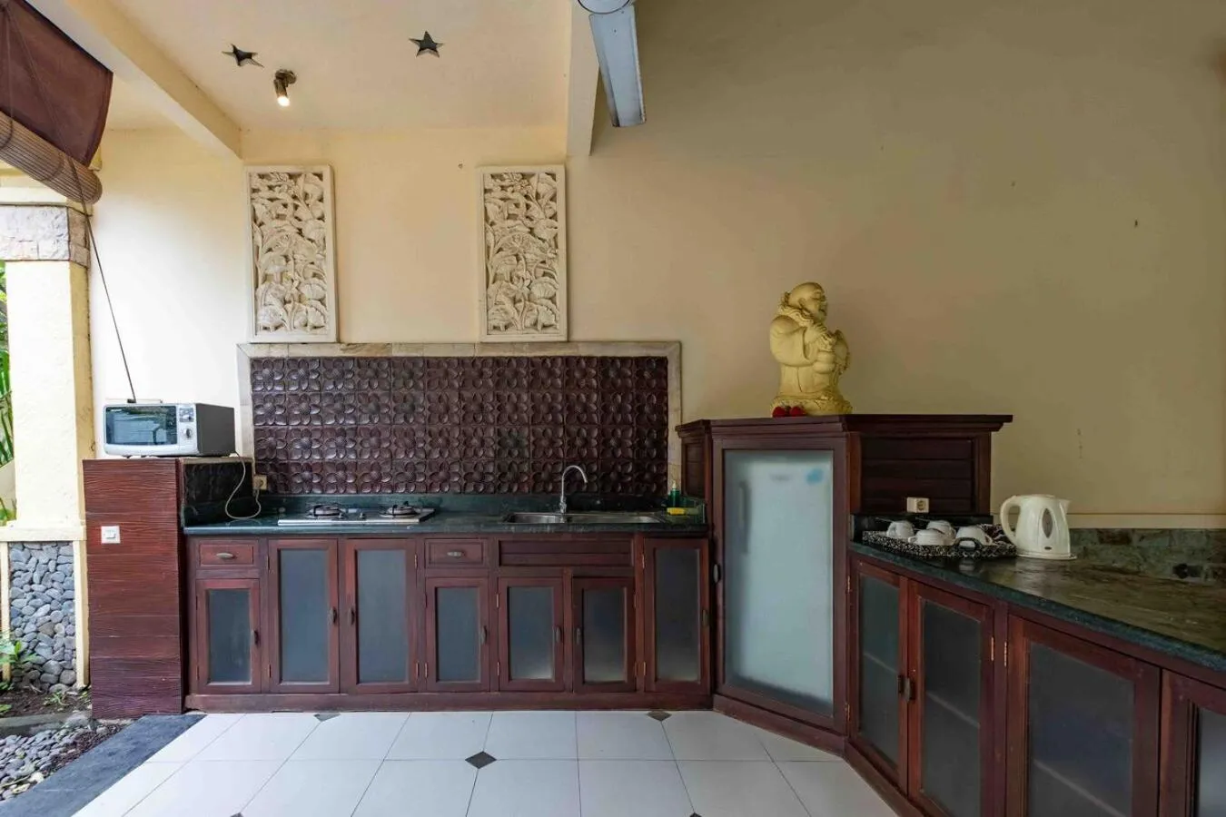 Kitchen or kitchenette in Amertha Bali Villas