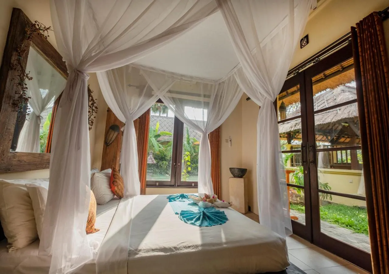Bed in Amertha Bali Villas