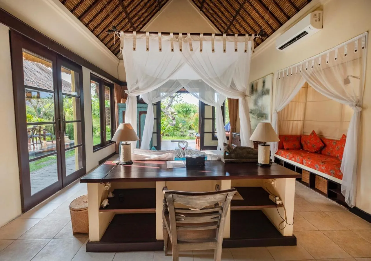 Bed in Amertha Bali Villas