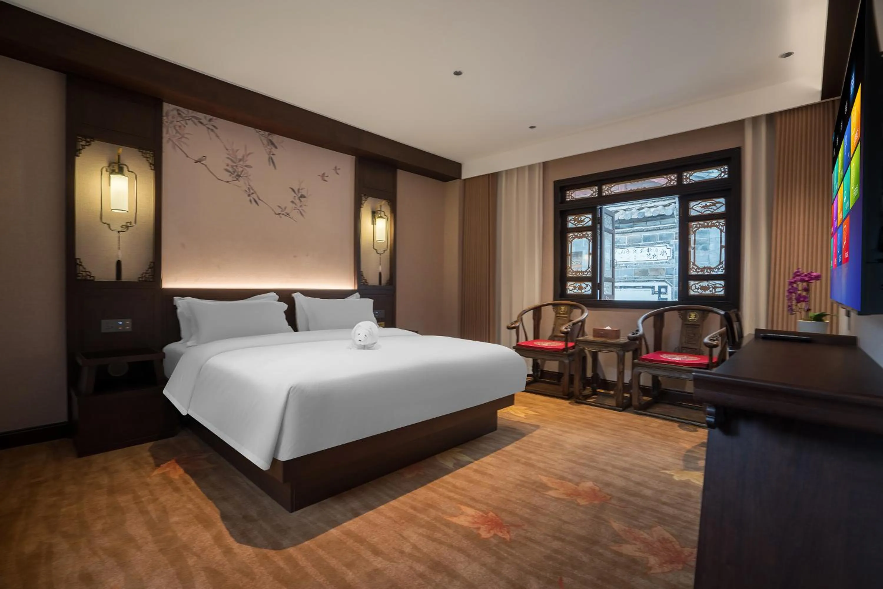 Bed in Lijiang Wangfu Hotel