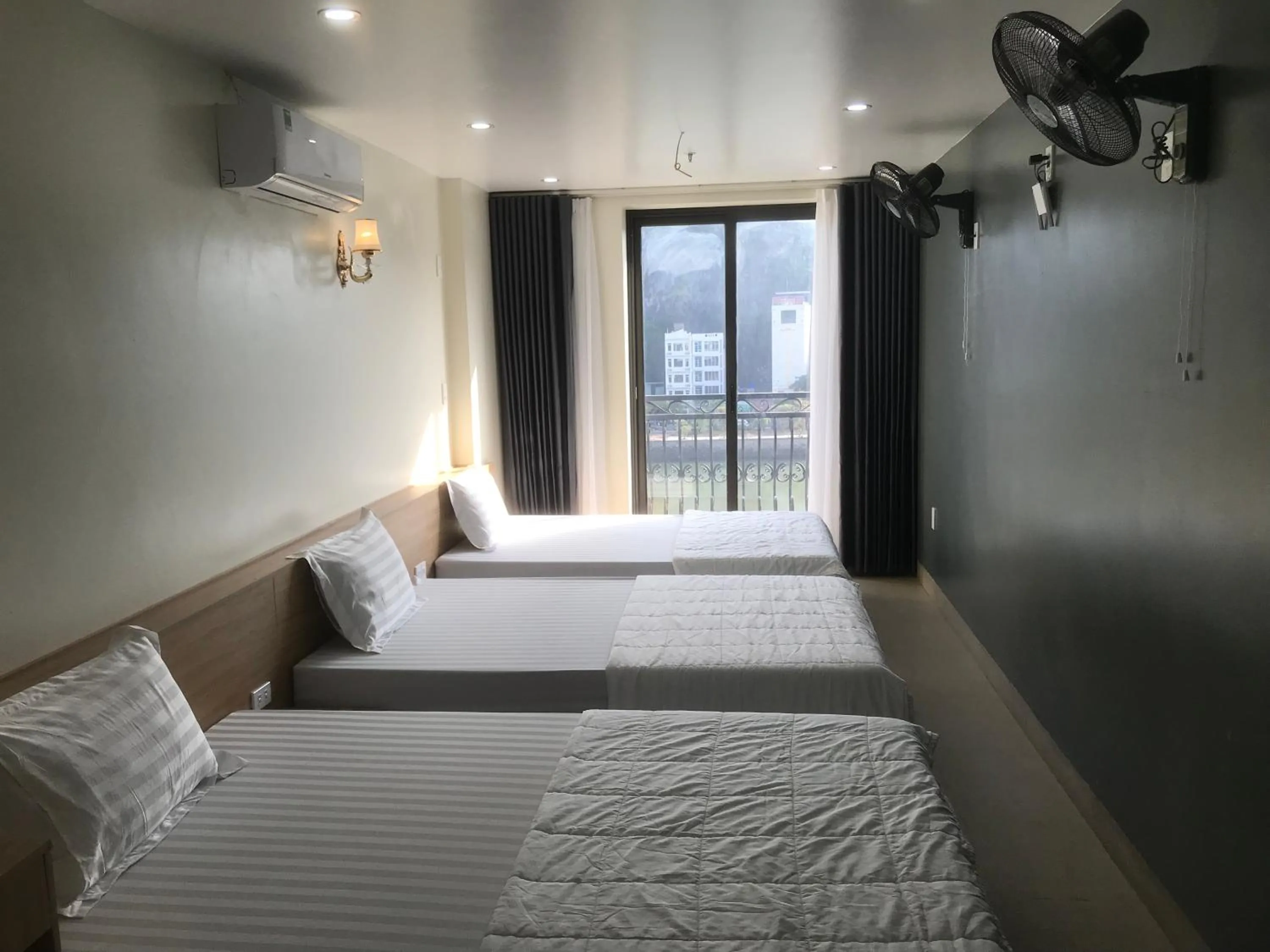 Bed in Sea Balcony Hotel