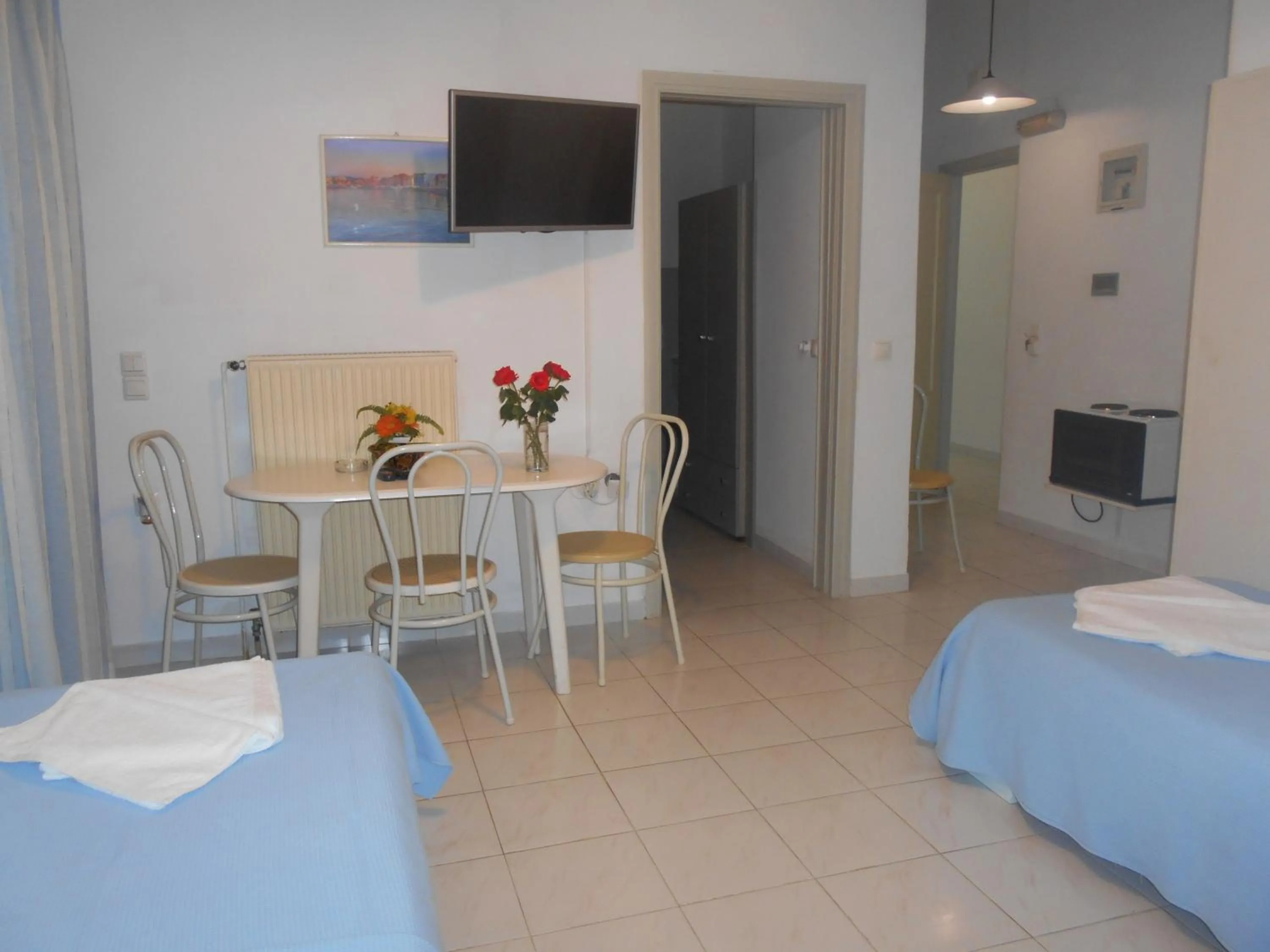 Kitchen or kitchenette, Bed in Ilona Apartments Chania