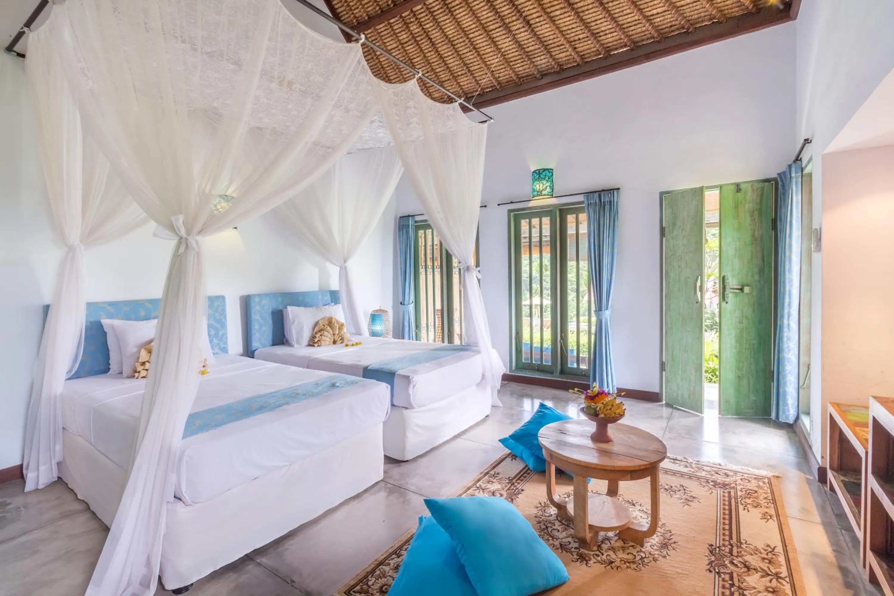 Bed in Puri Taman Sari Resort