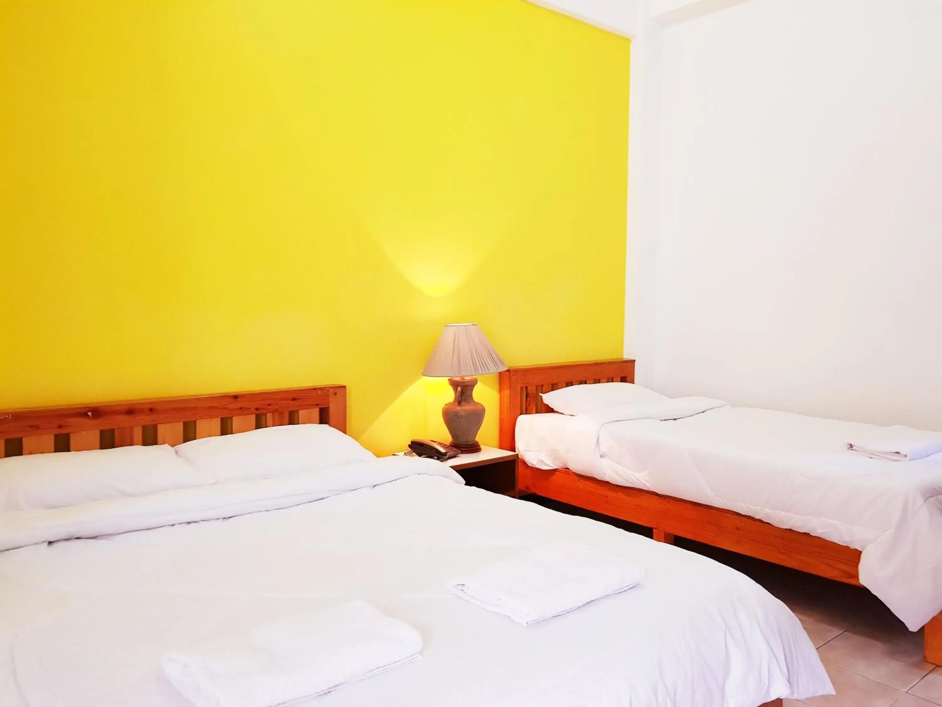 Triple Room with Private Bathroom in Wiang Inn Mansion Triple Room with Private Bathroom in Wiang Inn Mansion