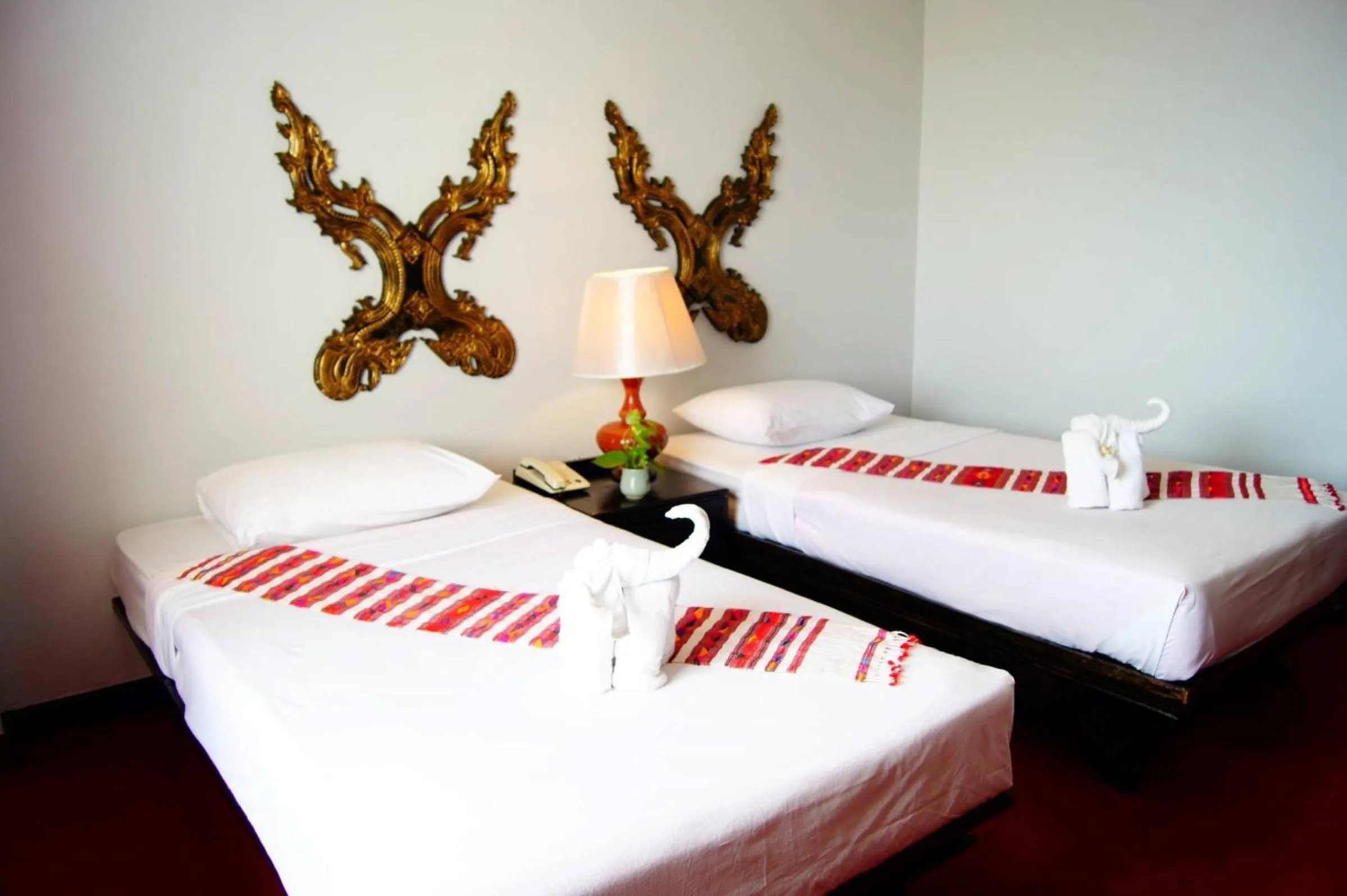 Bed in The International Hotel Chiang Mai - YMCA