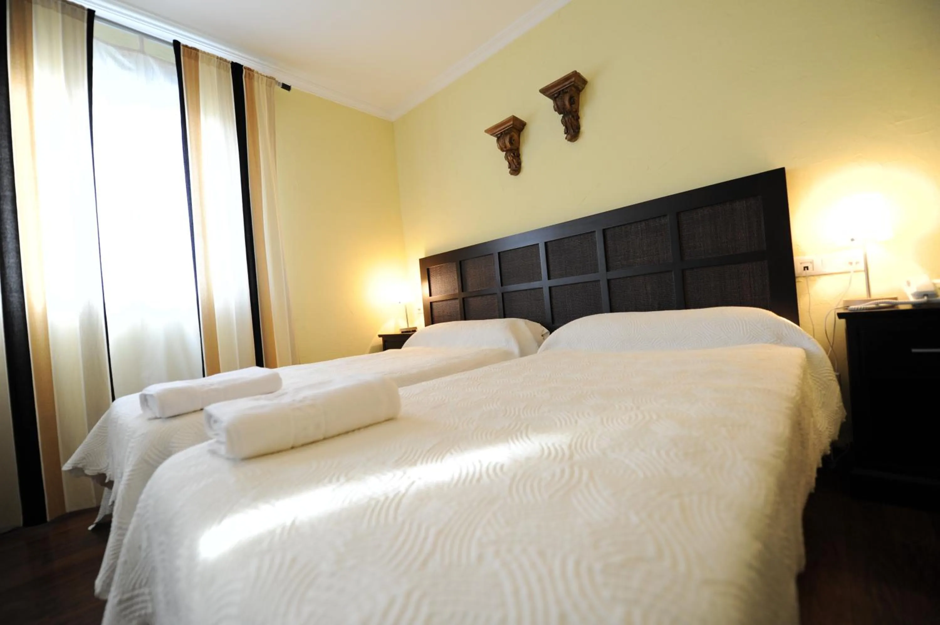 Decorative detail, Bed in Hotel Montearoma