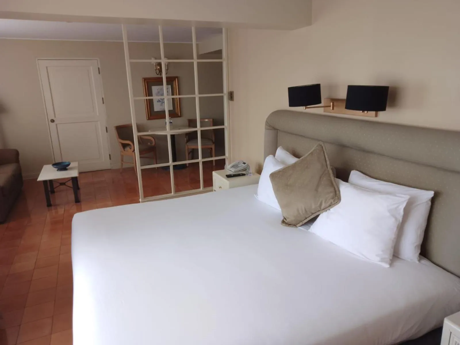 Bed in Suites del Bosque Hotel