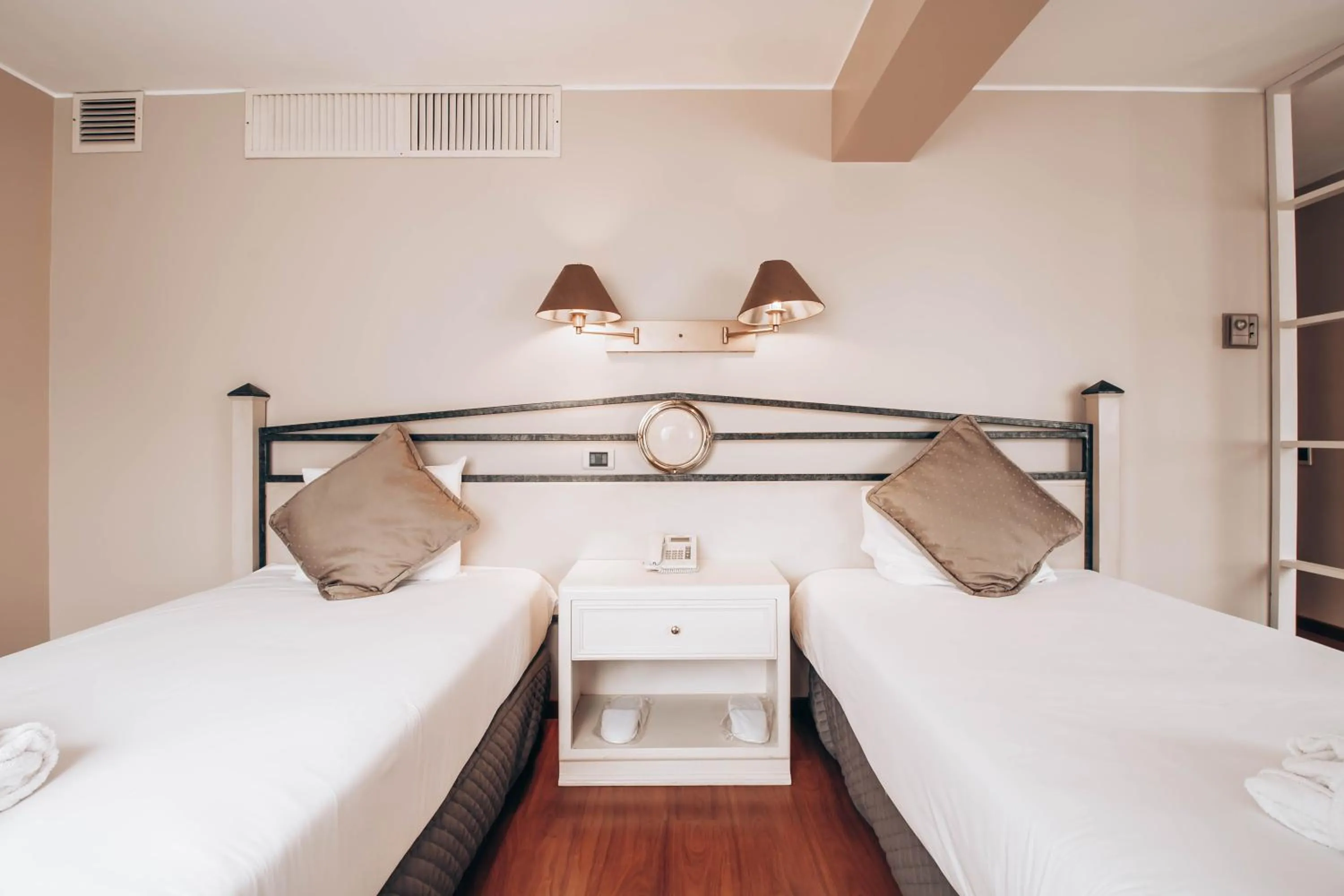 Bed in Suites del Bosque Hotel