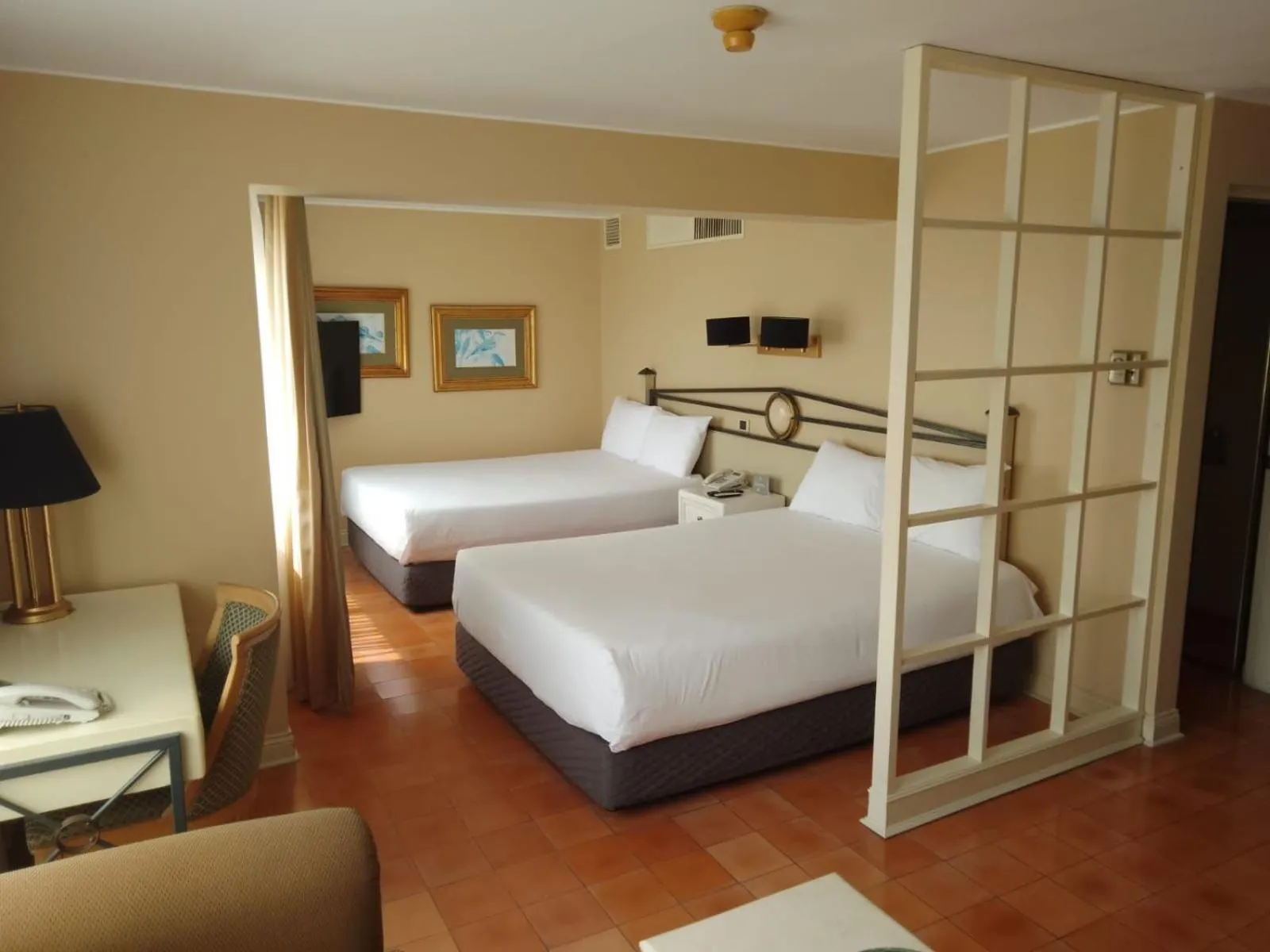 Bed in Suites del Bosque Hotel