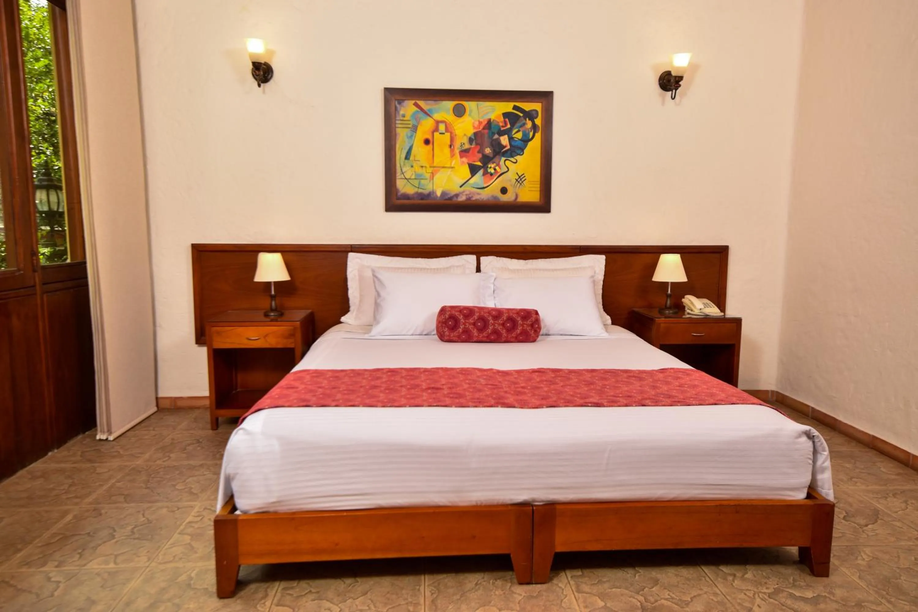 Bed in La Campana Hotel Boutique