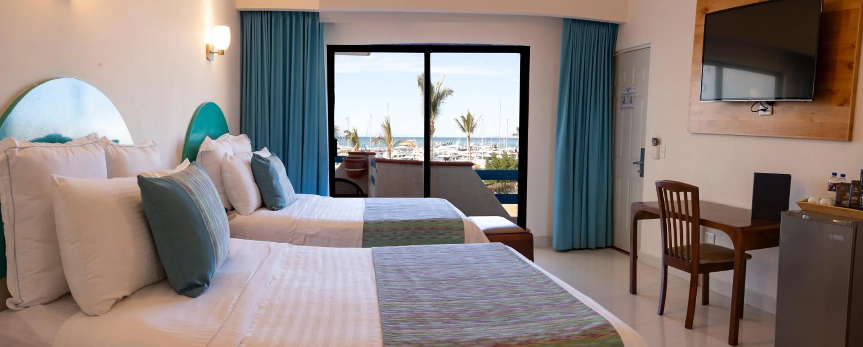 Bed in The Westmarine Waterfront Hotel