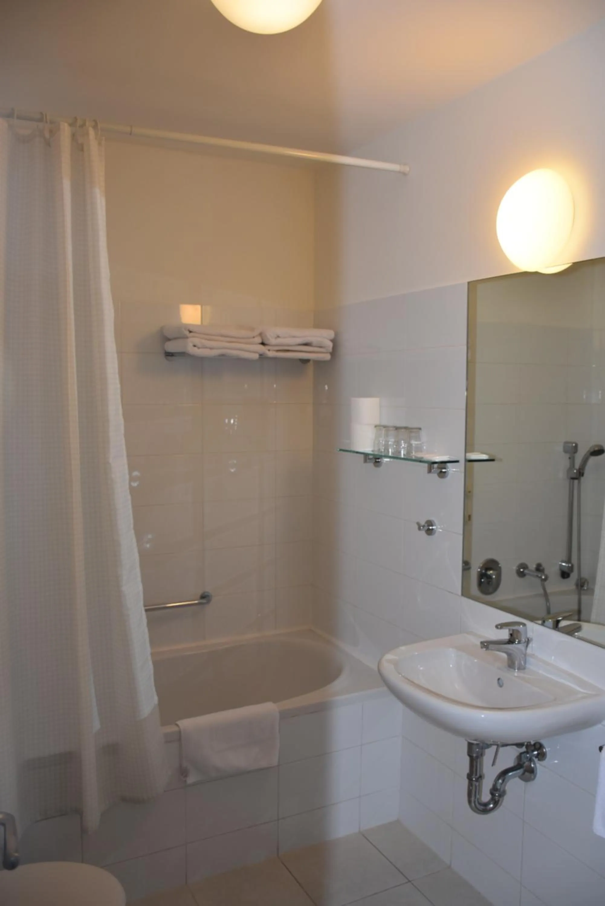 Bathroom in Aparthotel Austria Suites