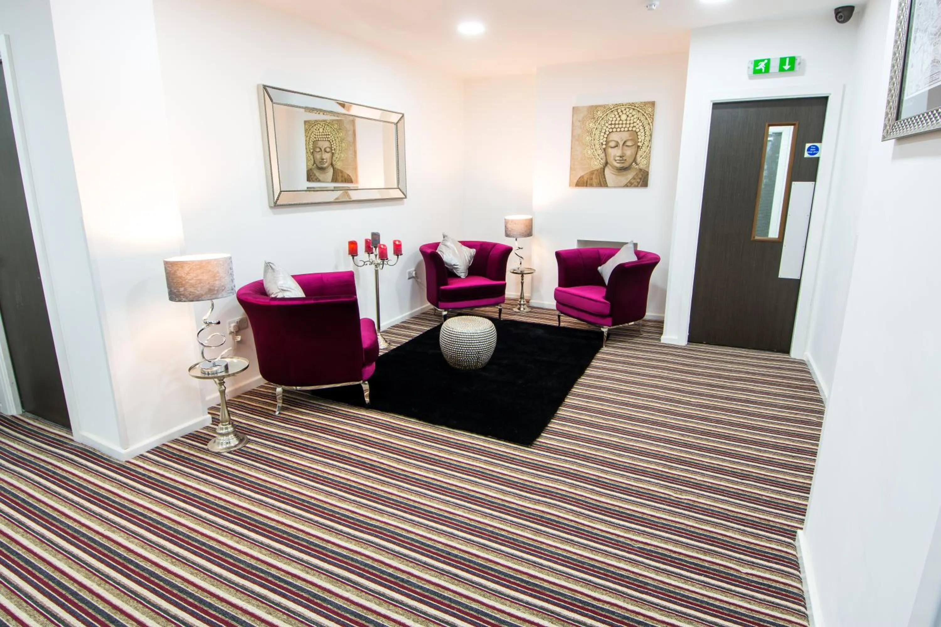 Communal lounge/ TV room in Abbey Hotel