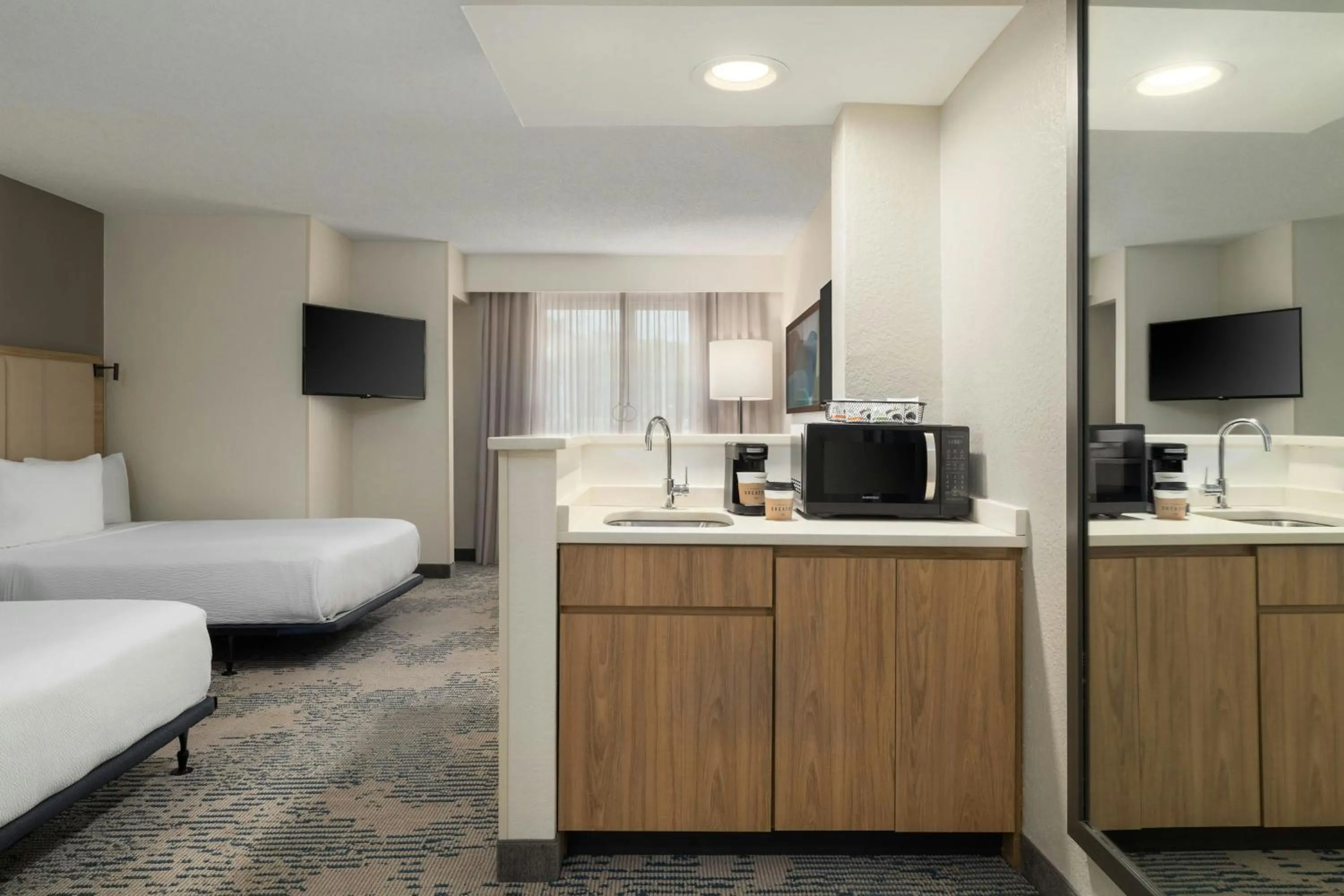 Photo of the whole room, Bed in SpringHill Suites Boca Raton