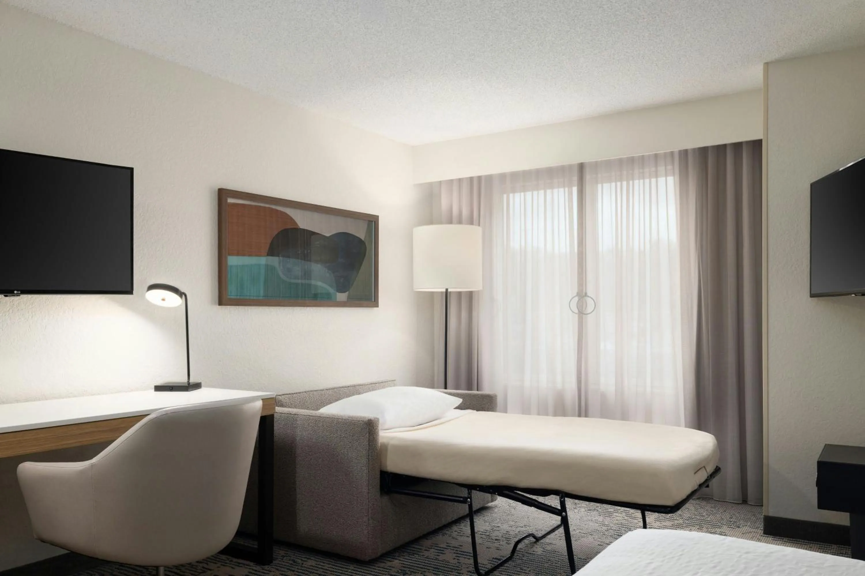 Photo of the whole room, Bed in SpringHill Suites Boca Raton