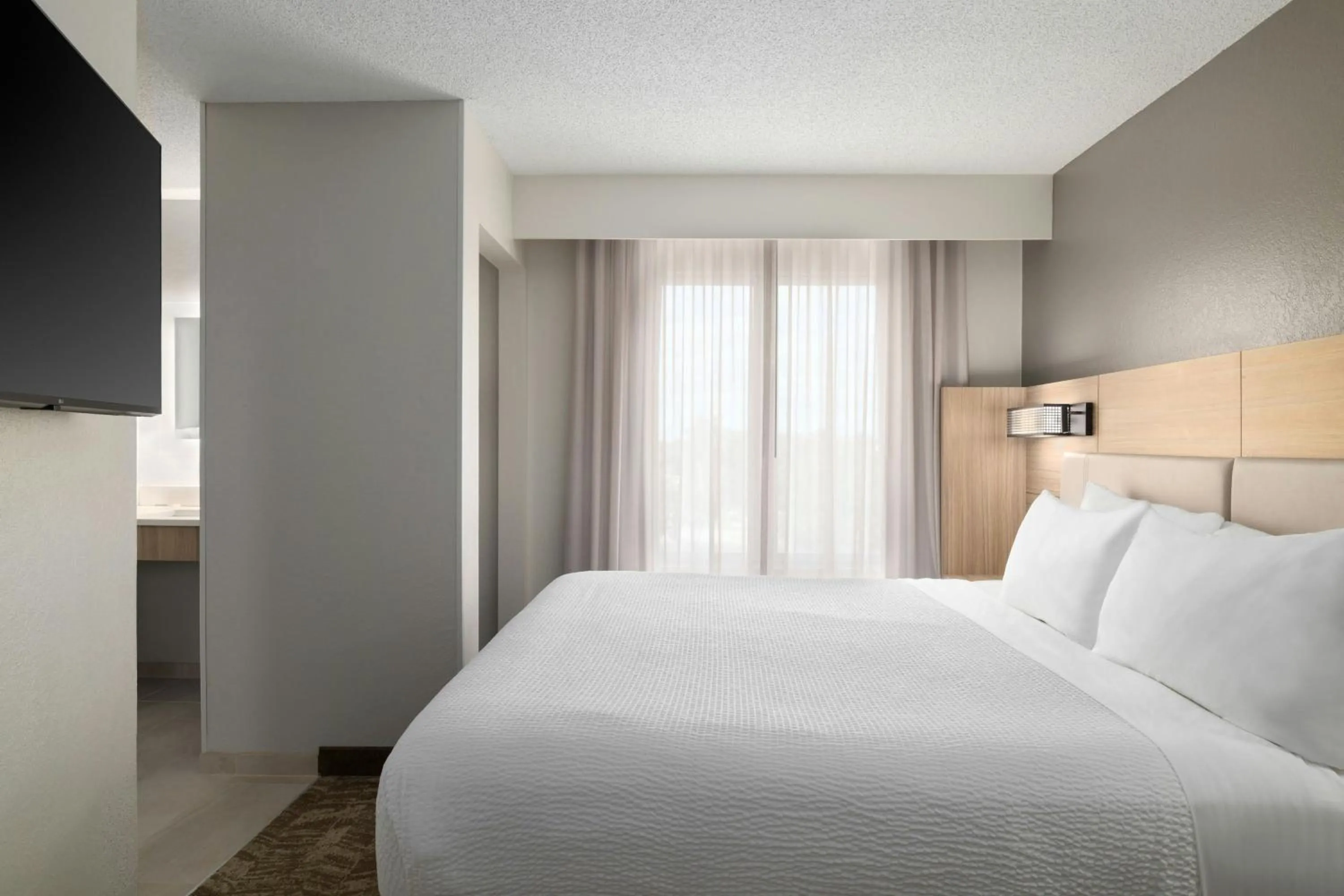 Photo of the whole room, Bed in SpringHill Suites Boca Raton