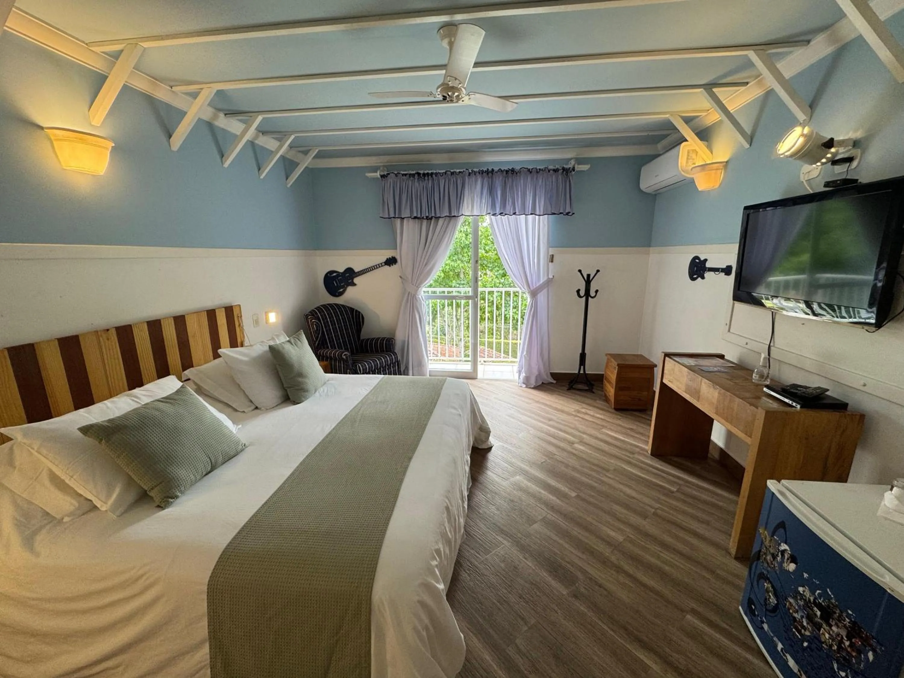 TV and multimedia, Bed in Pousada Piano Piano