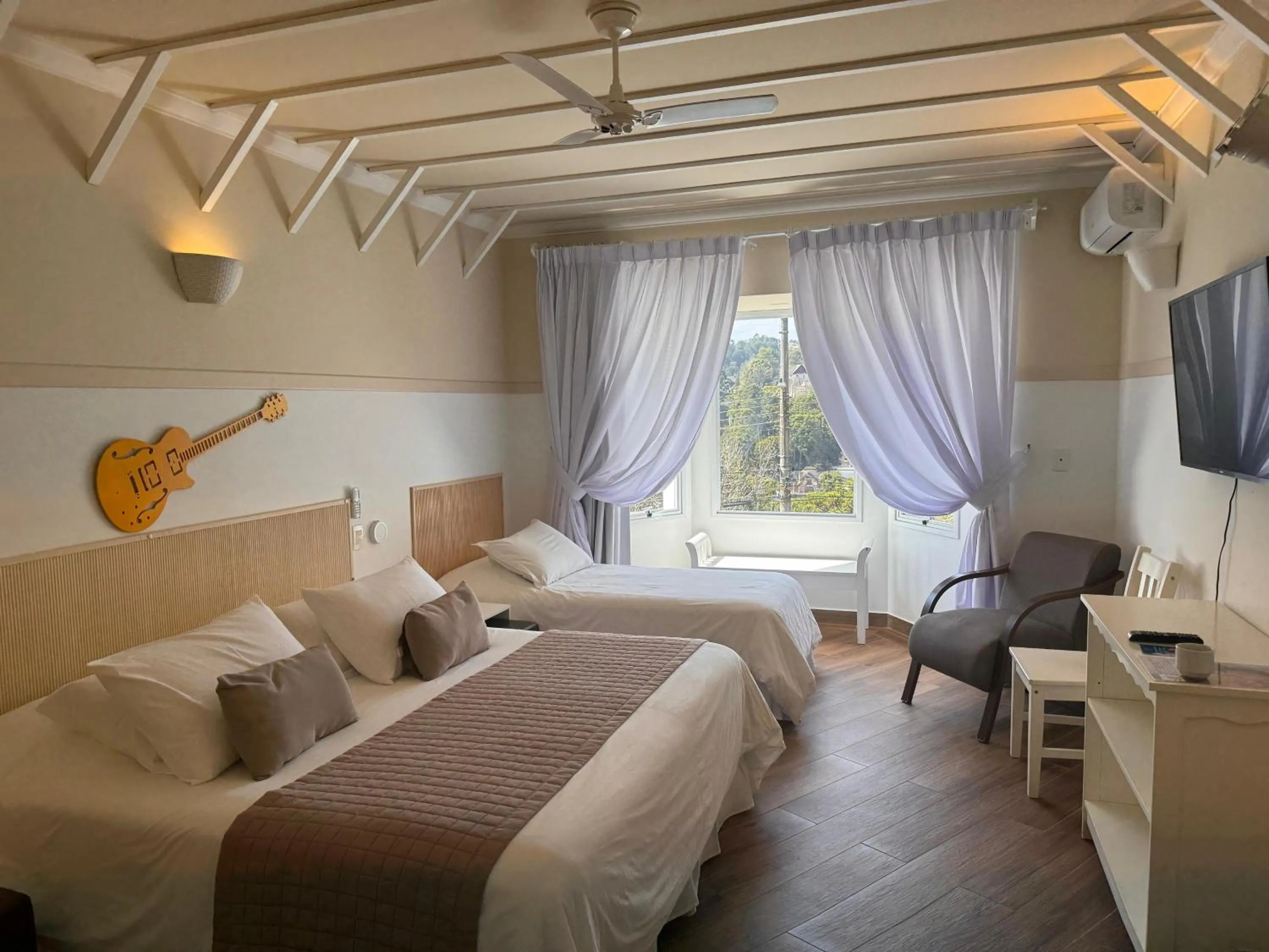 TV and multimedia, Bed in Pousada Piano Piano